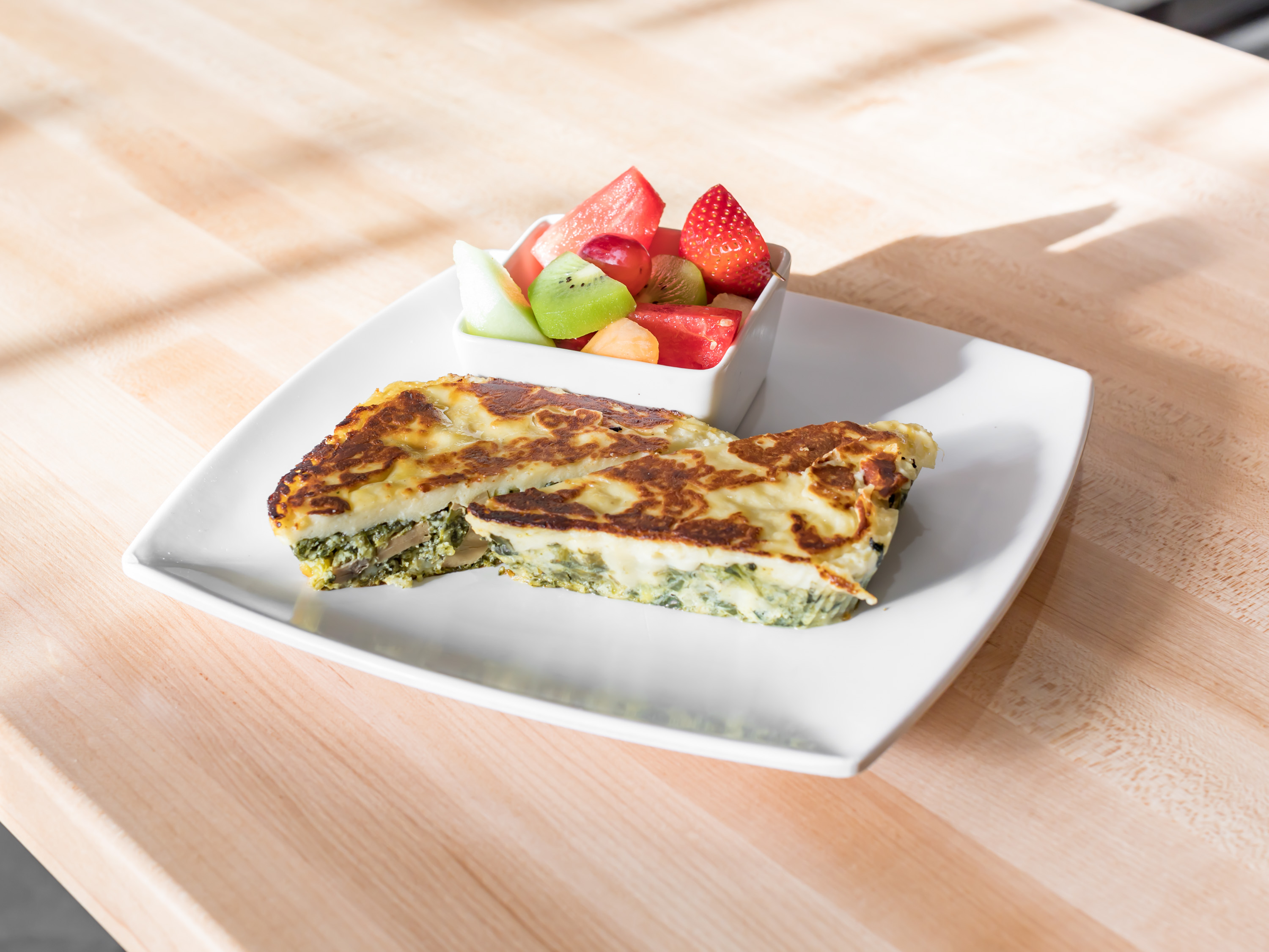 Order Spinach Quiche food online from Half Day Cafe store, Rochester Hills on bringmethat.com