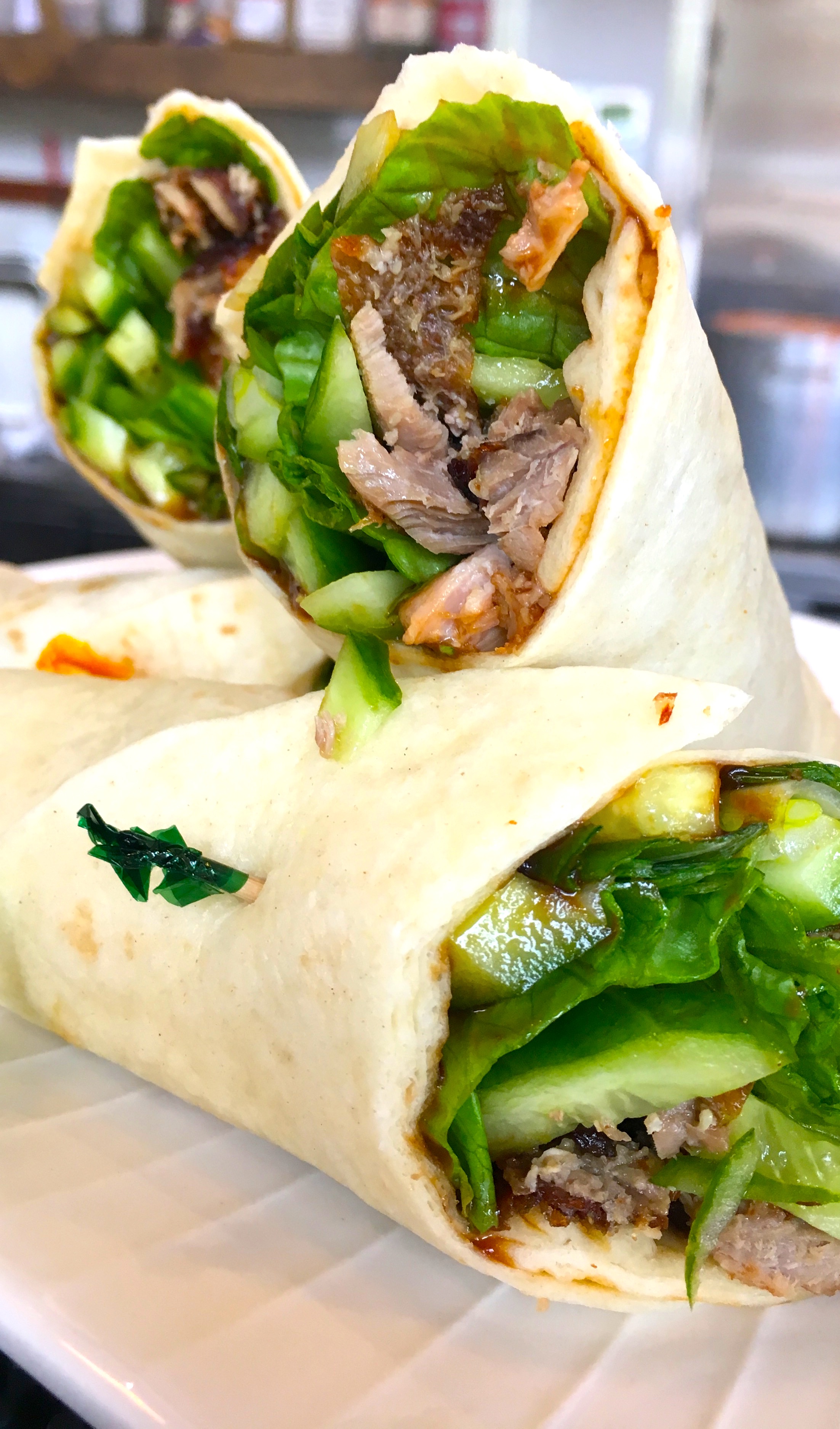 Order ROASTED DUCK WRAP food online from Soup Du Jour store, San Diego on bringmethat.com