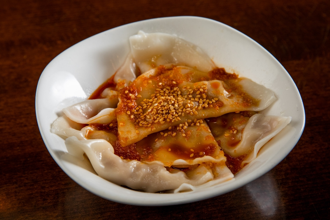 Order +Pork Dumplings in Chili Oil food online from Han Dynasty store, New York on bringmethat.com