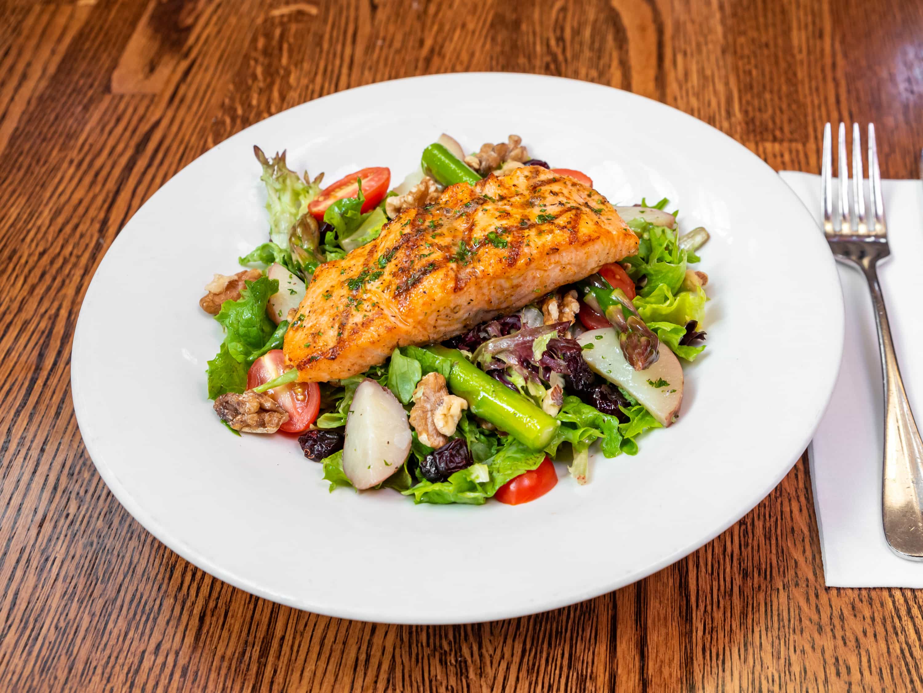 Order Grilled Salmon Salad food online from P.J. Skidoos store, Fairfax on bringmethat.com