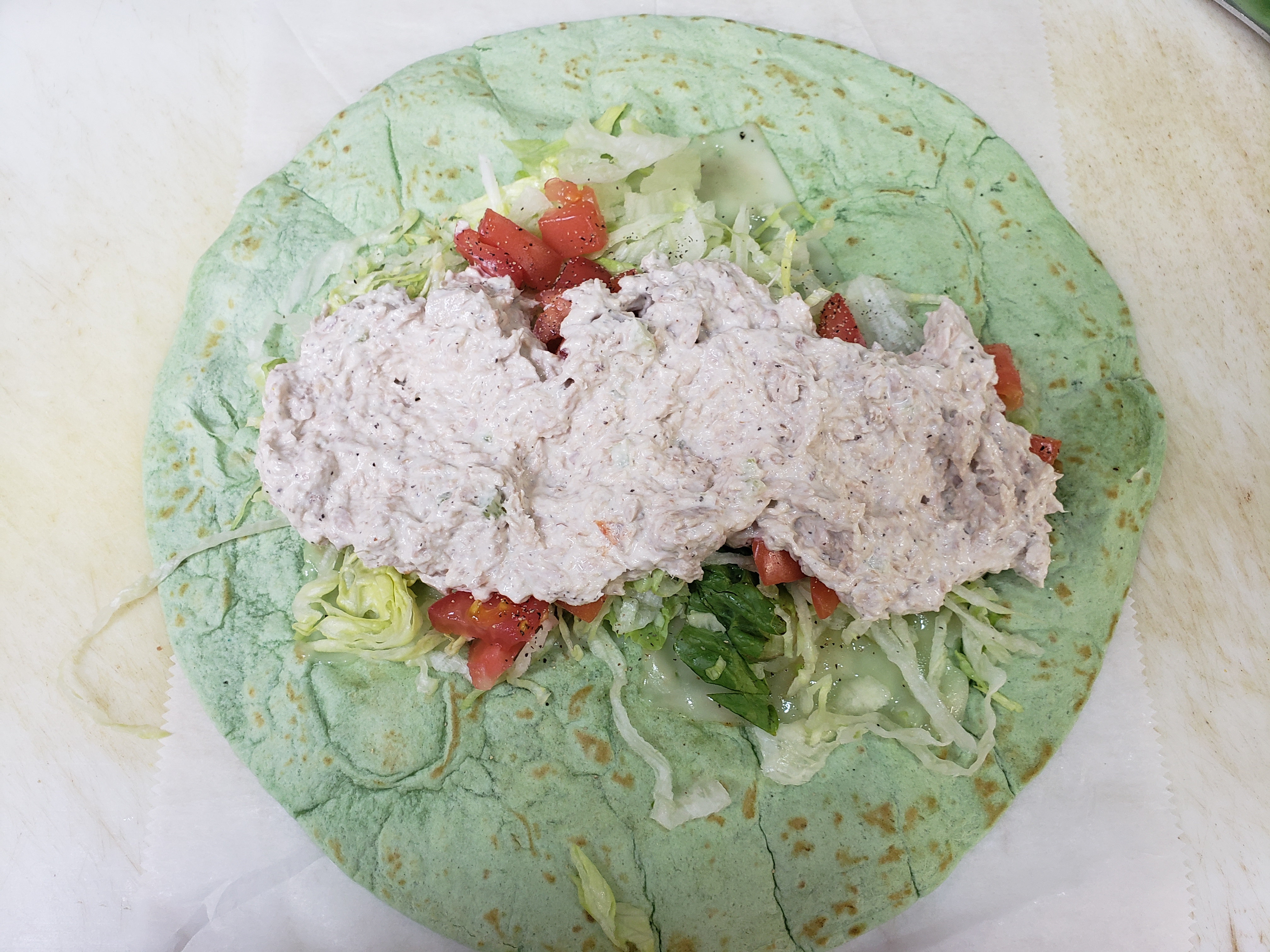 Order Tuna Cold Wrap food online from S. Gardens Deli store, Springfield Gardens on bringmethat.com