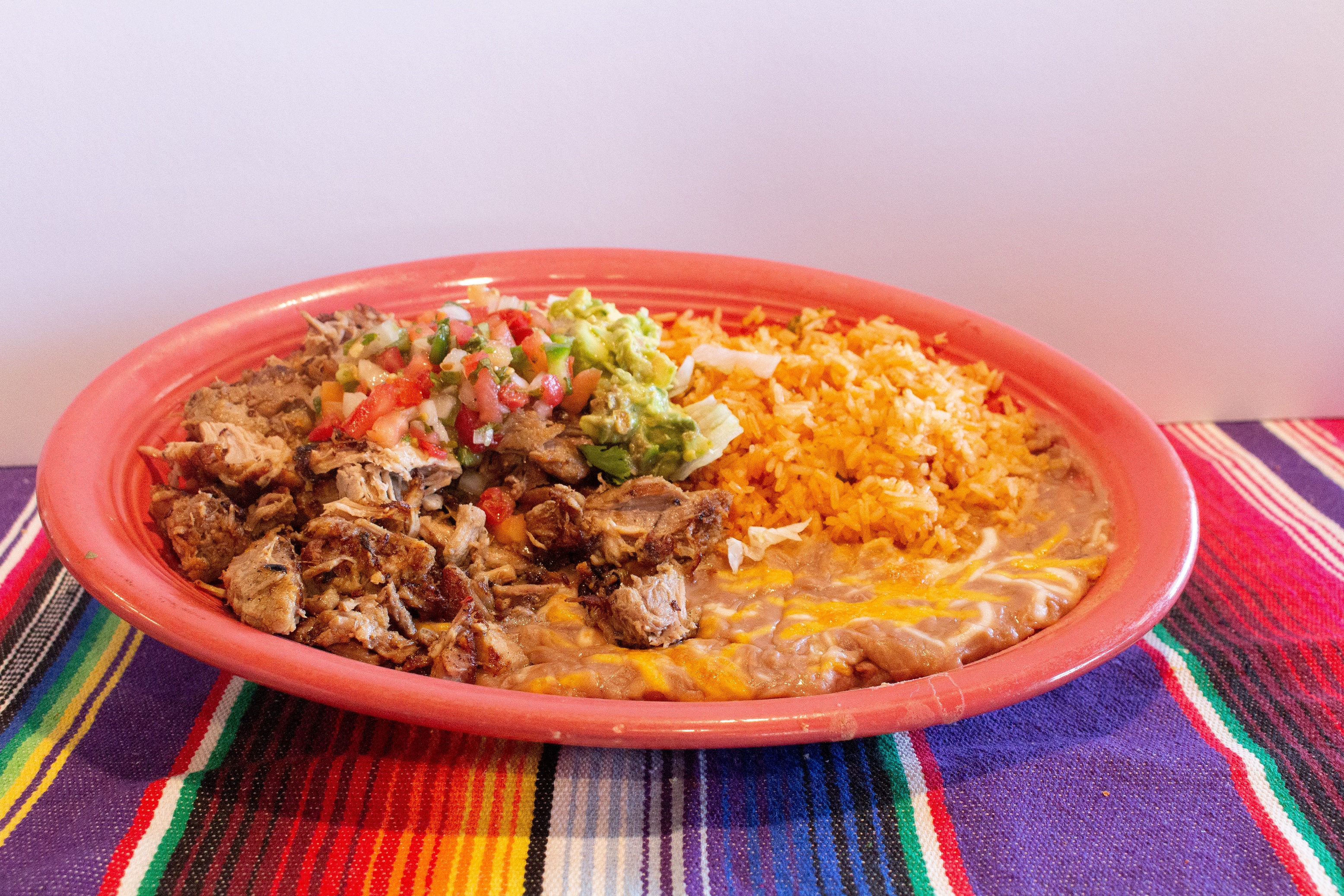 Order Carnitas Plate food online from Fiesta Mex Grill store, Stanton on bringmethat.com