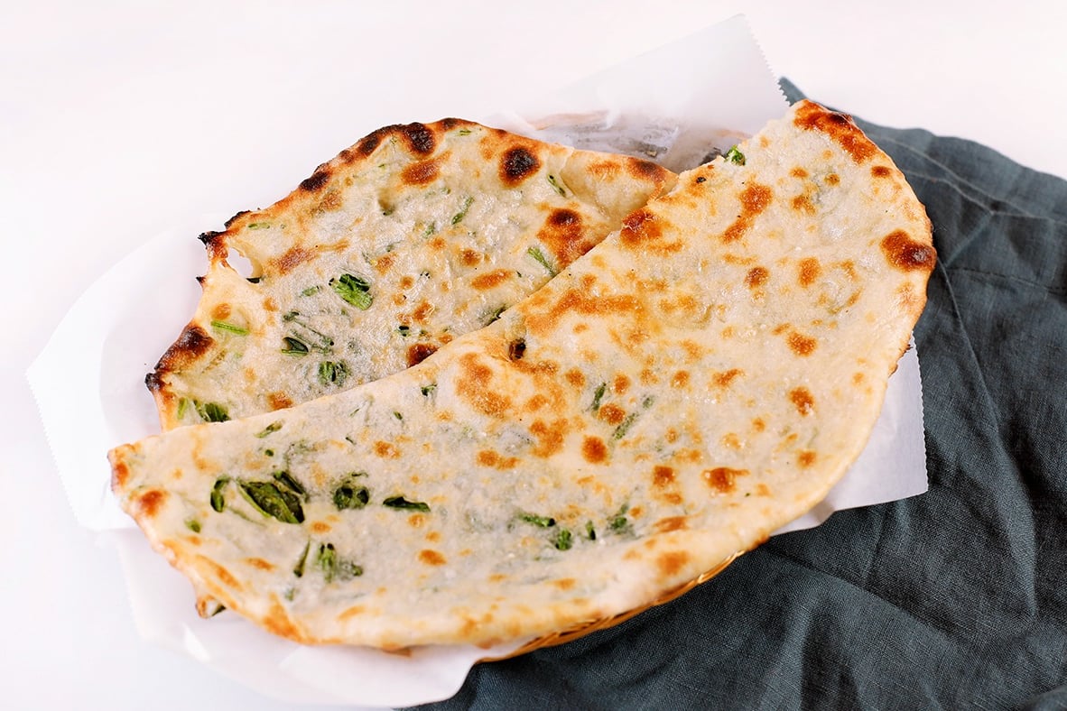 Order Spinach Naan food online from Royal Indian Cuisine store, San Francisco on bringmethat.com
