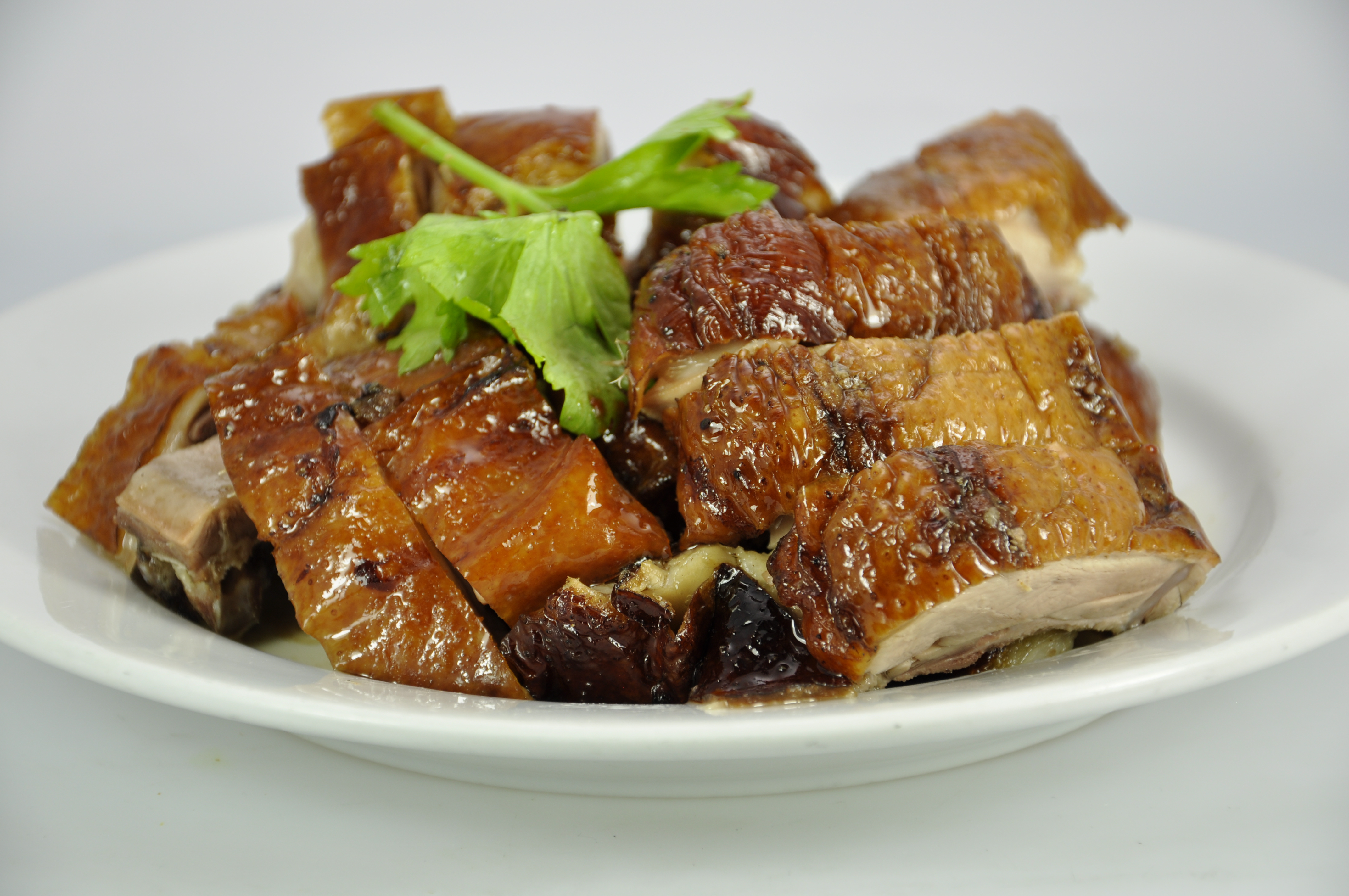 Order Roast Duck food online from Kaieteur Express Restaurant store, South Richmond Hill on bringmethat.com