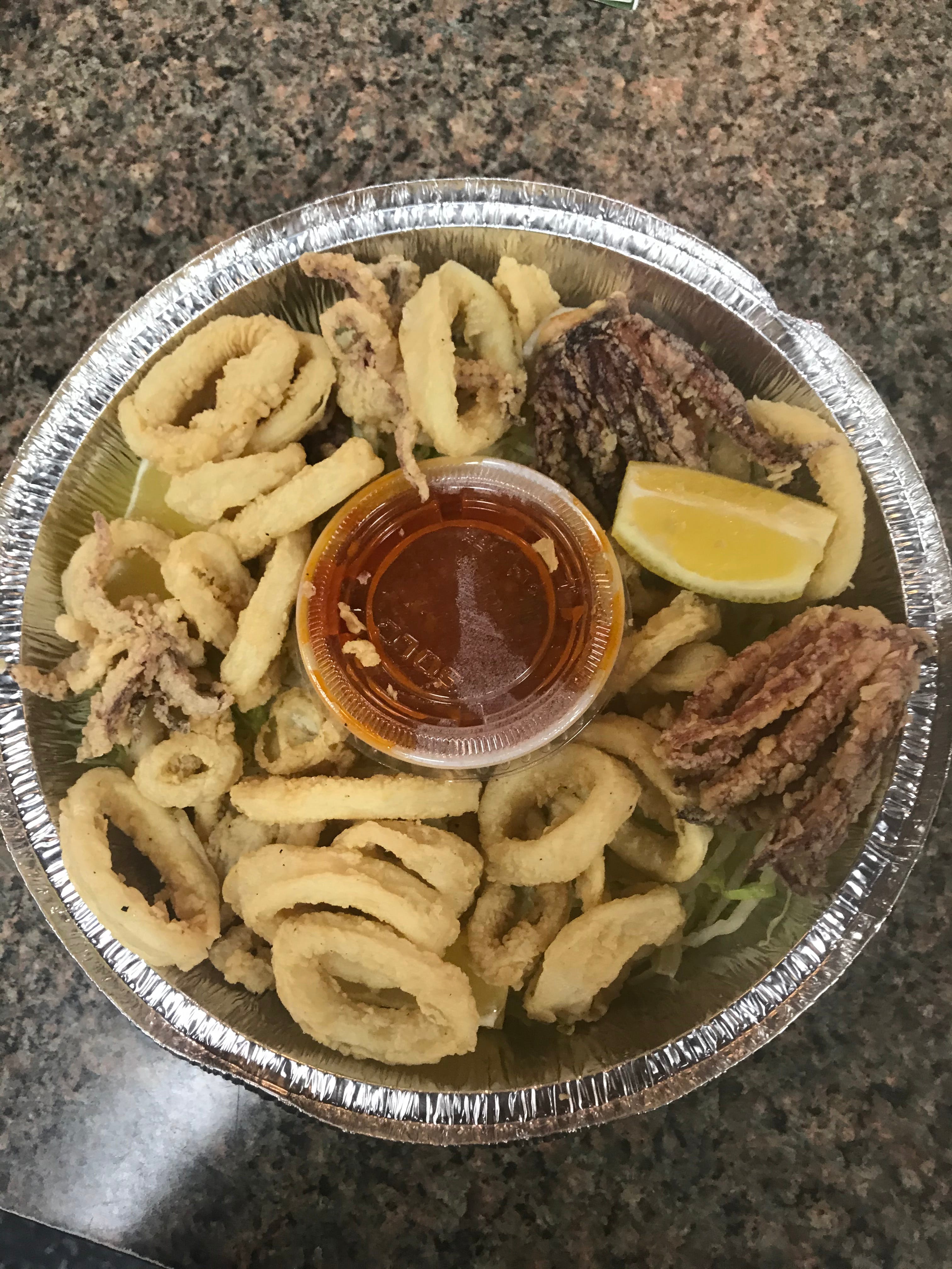 Order Fried Calamari - Appetizer food online from Villa Russo Pizzeria store, Clementon on bringmethat.com