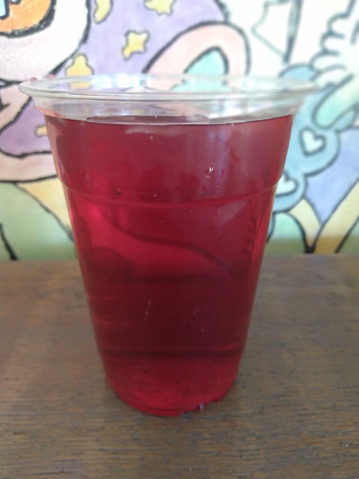 Order Organic Iced Hibiscus Tea food online from Grounded For Life store, Clinton on bringmethat.com