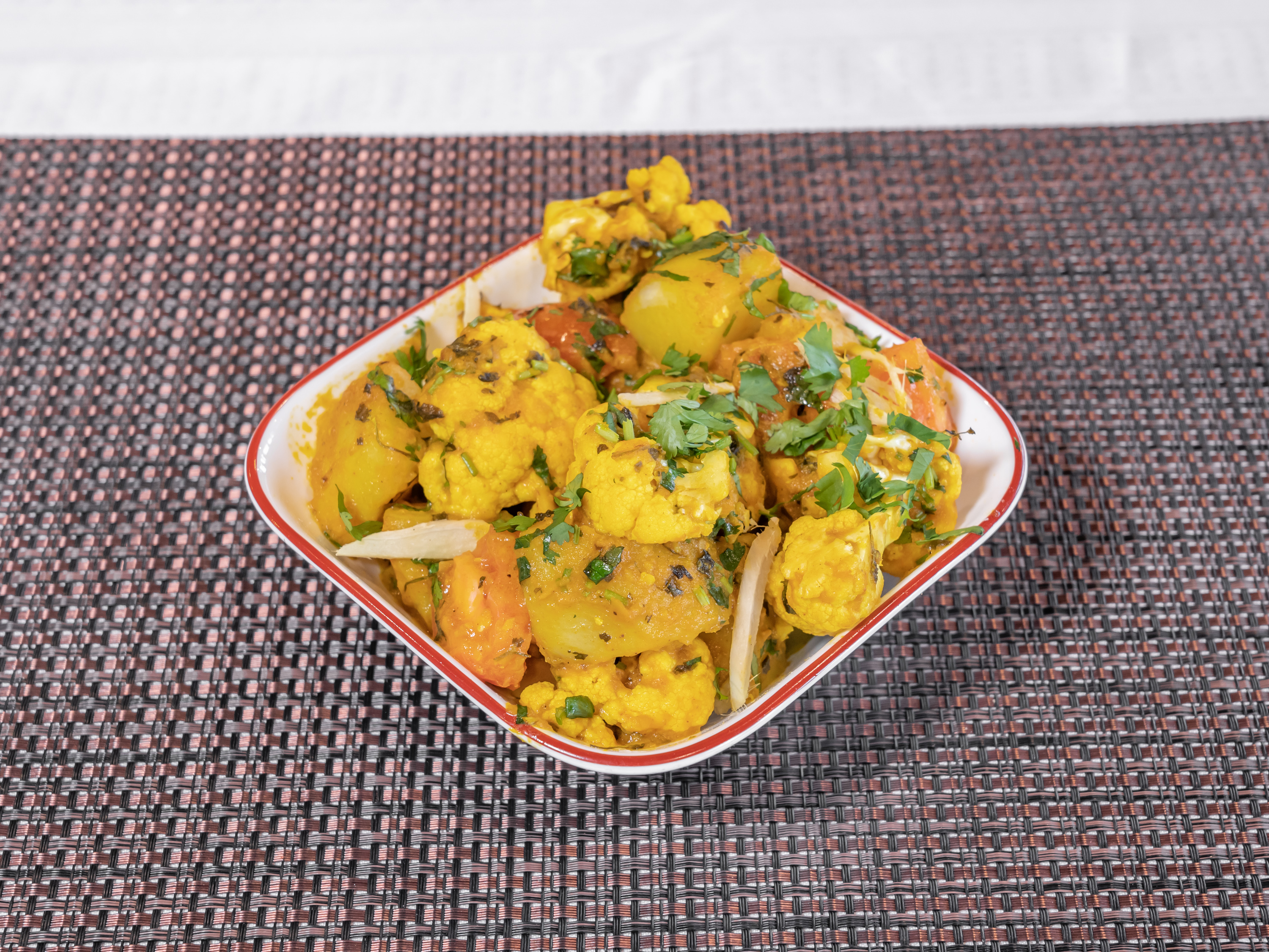 Order 44. Aloo Gobi food online from Charminar Biryani House store, Troy on bringmethat.com