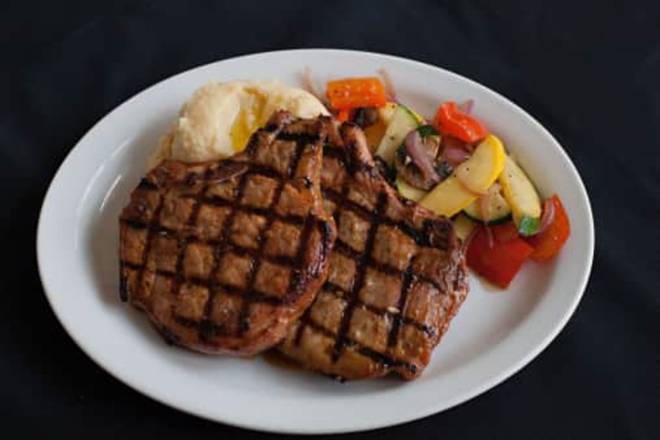 Order Pork Chops (dinner) food online from NoNos Cafe store, Highlands Ranch on bringmethat.com
