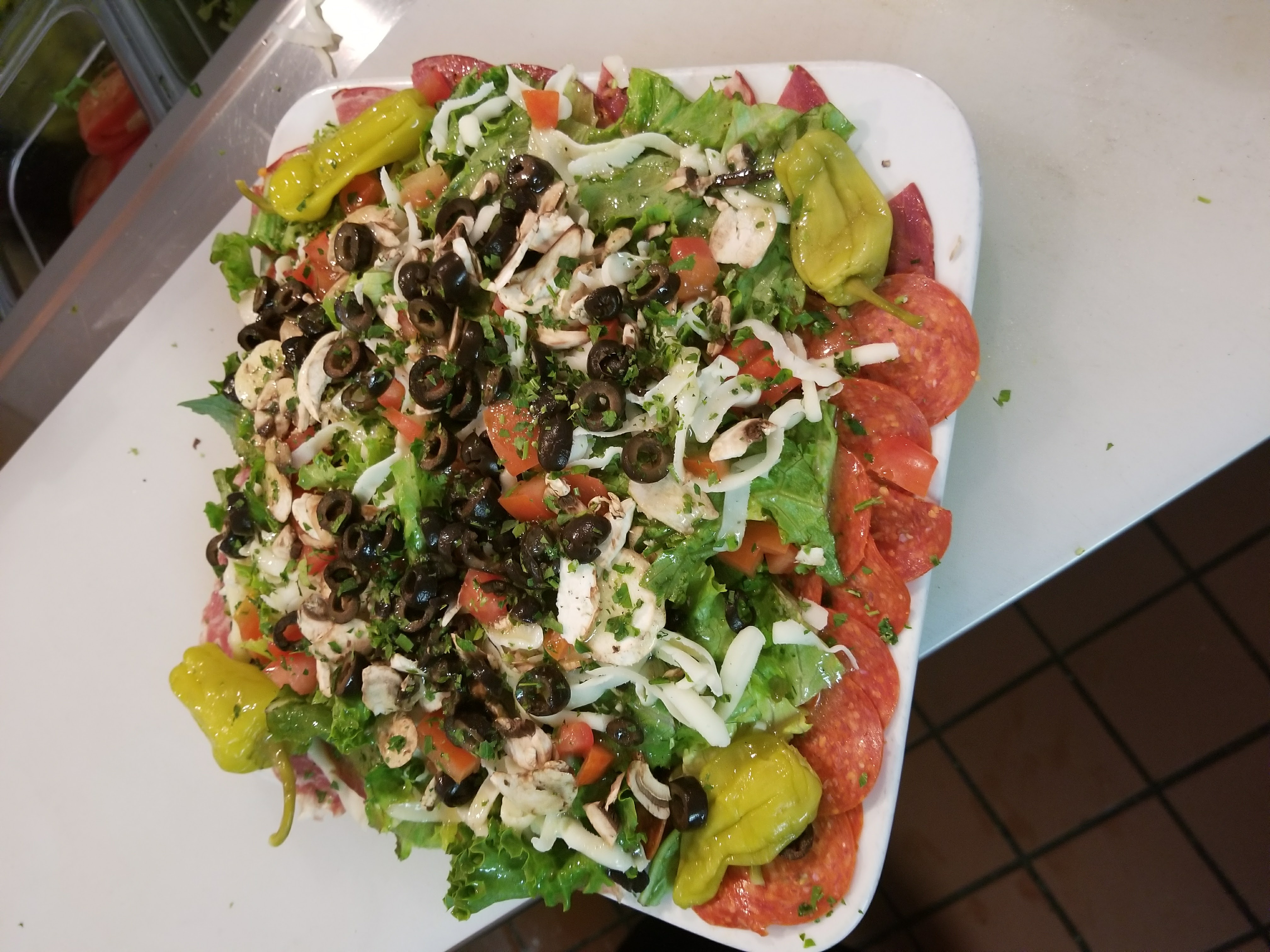 Order Antipasto Salad food online from Petrini's store, San Diego on bringmethat.com