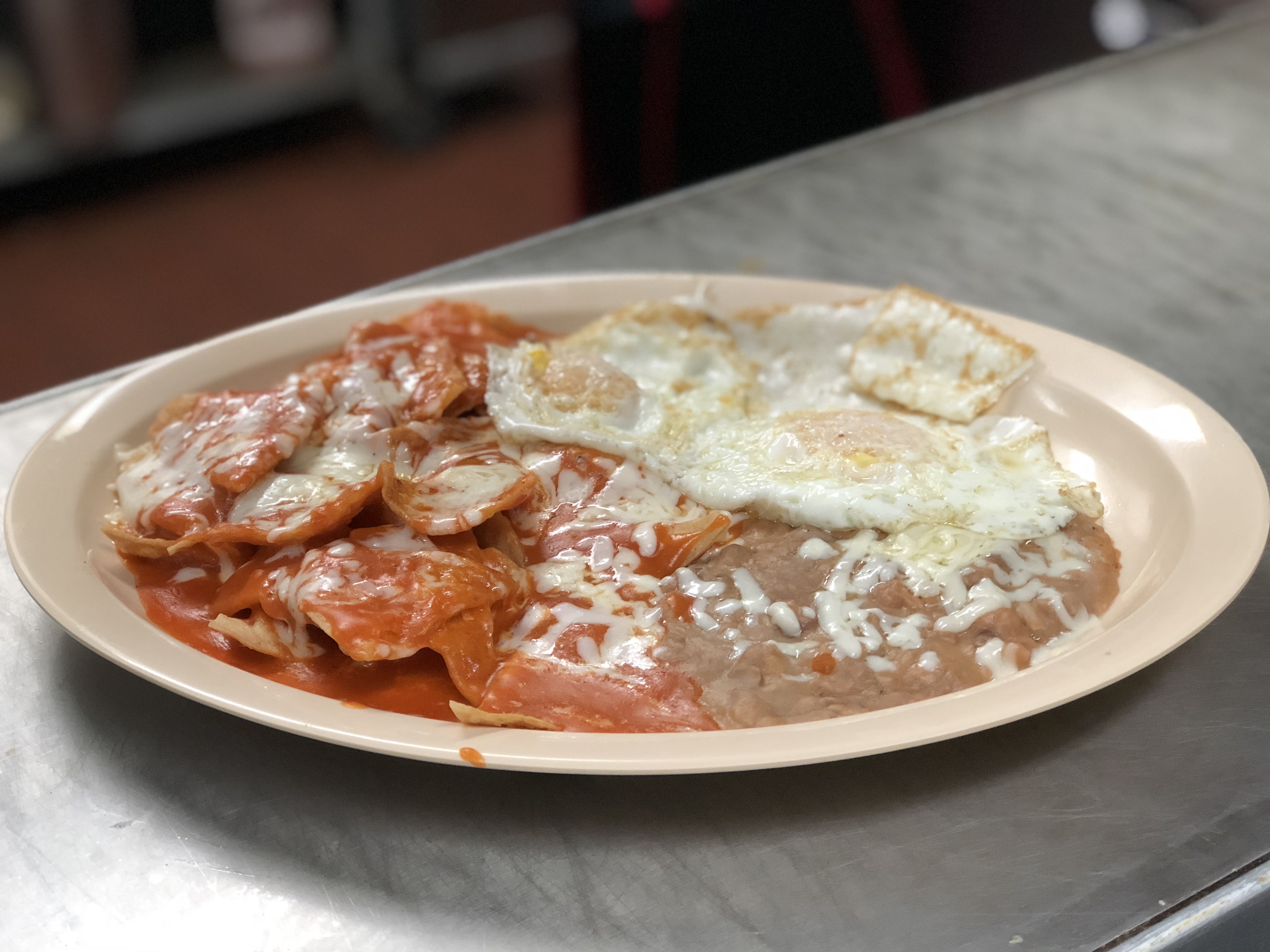Order Chilaquiles  food online from Cuauhtemoc Cafe store, El Paso on bringmethat.com