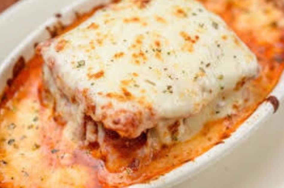 Order Lasagna - Oven Baked Pastas food online from Knolla's Pizza store, Wichita on bringmethat.com