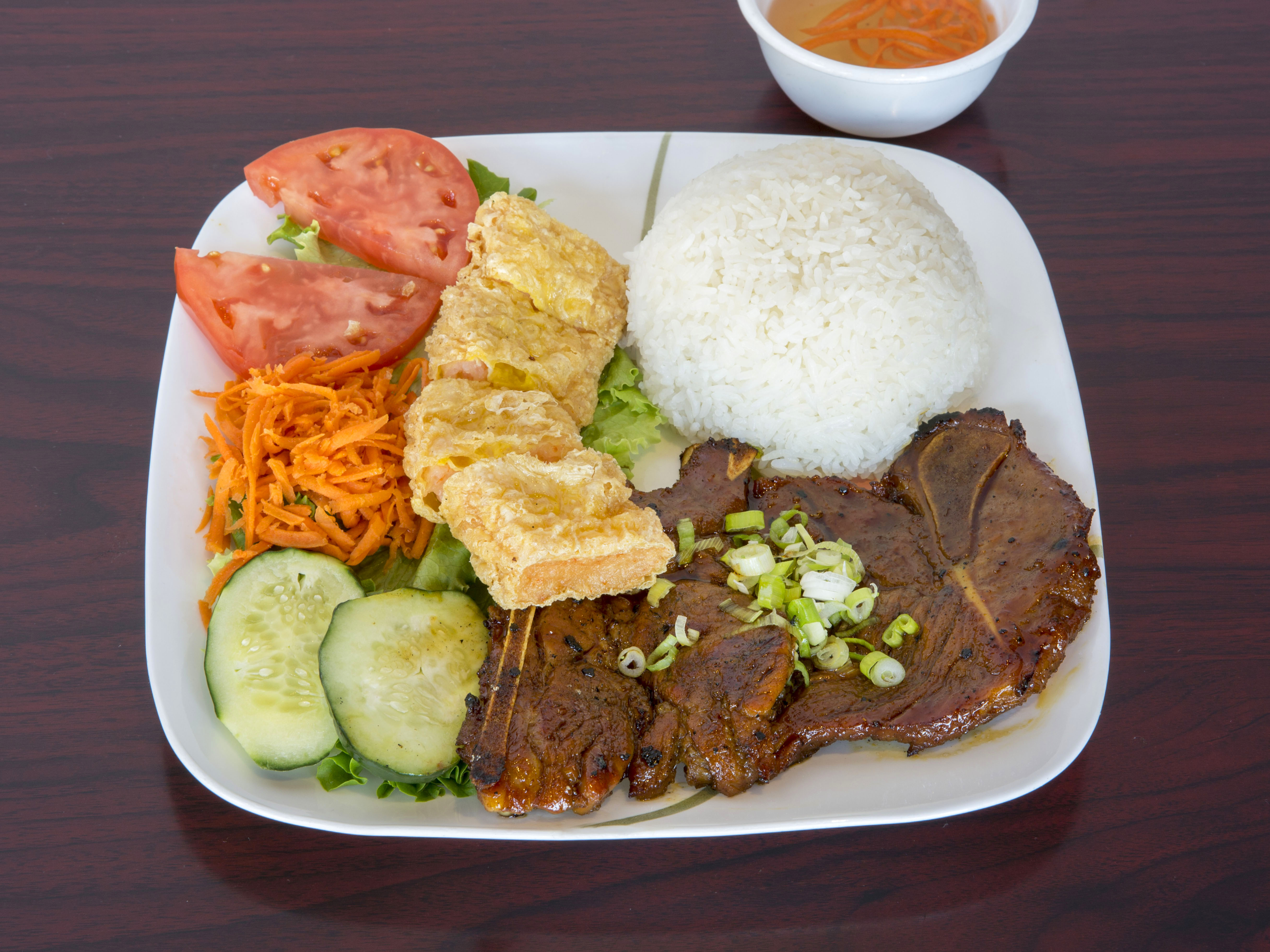 Order 36. Charbroiled Pork Chop, Bean Curd Skin Shrimp Paste and Rice food online from Pasadena Noodle & Grill store, Pasadena on bringmethat.com