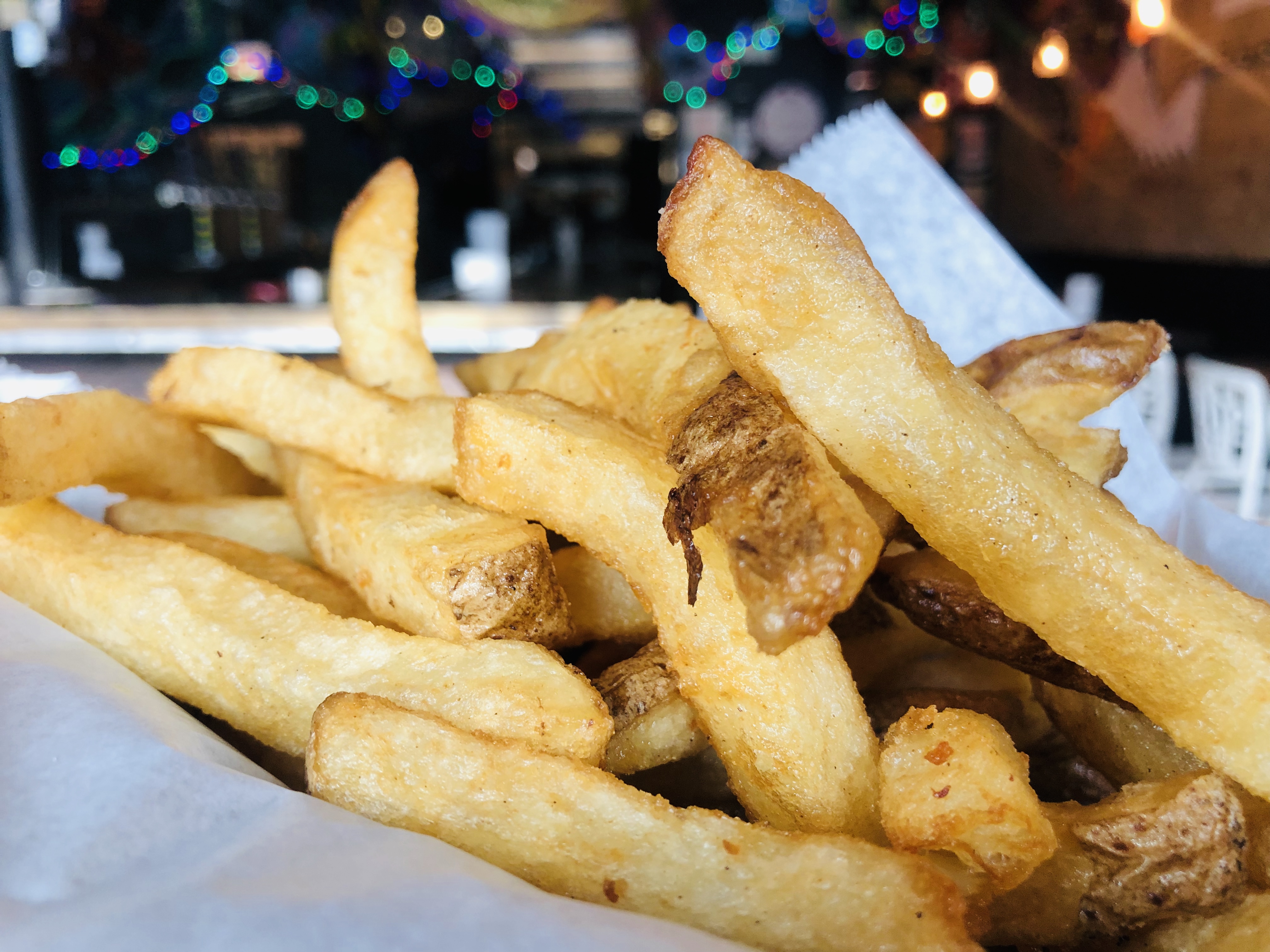 Order Plain Fries food online from Nola Bar & Kitchen store, Chicago on bringmethat.com