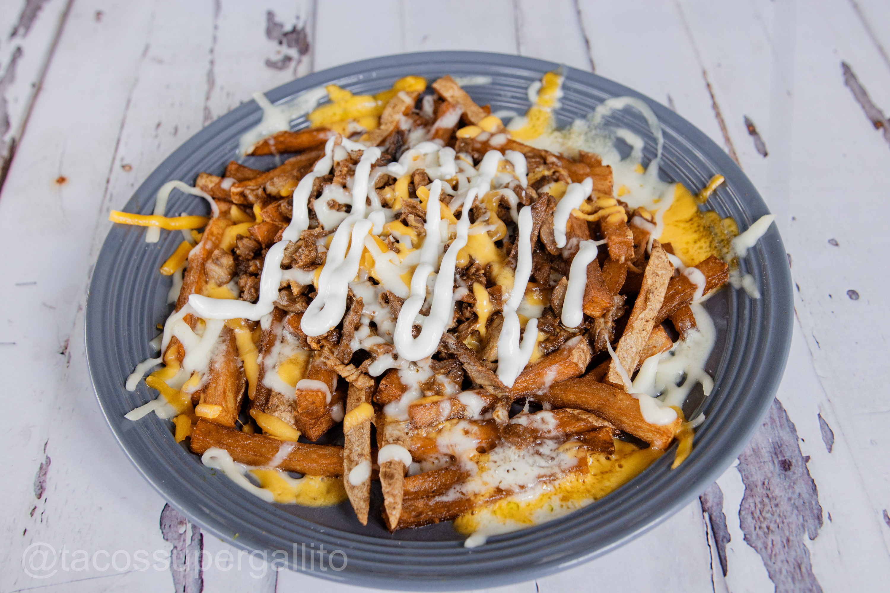 Order Asada Fries food online from Tacos Super Gallito store, Los Angeles on bringmethat.com