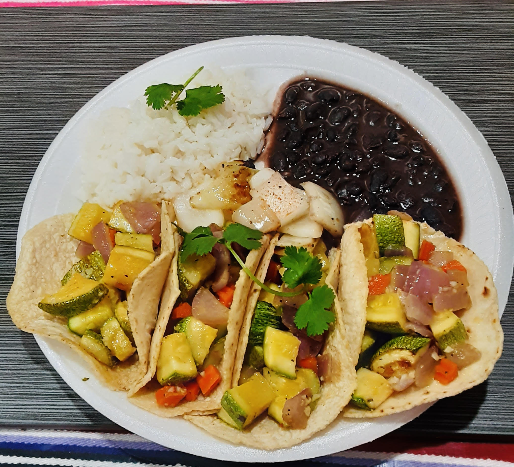 Order Vegan Zucchini Tacos (4) con Arroz y Frijoles food online from Curry Sabor store, Whittier on bringmethat.com