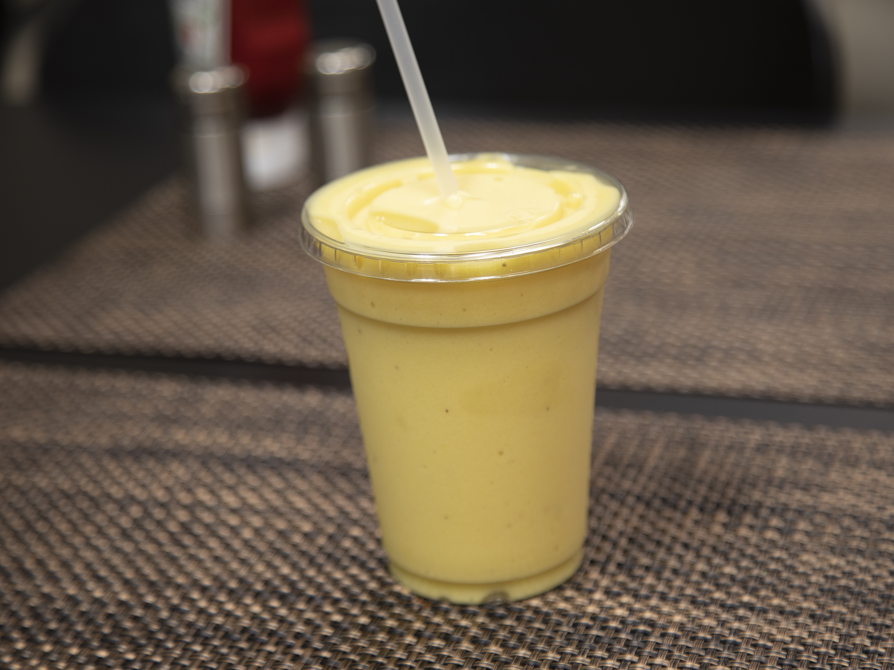 Order Tropical Explosion Smoothie food online from Emmeli Cake store, Boise on bringmethat.com