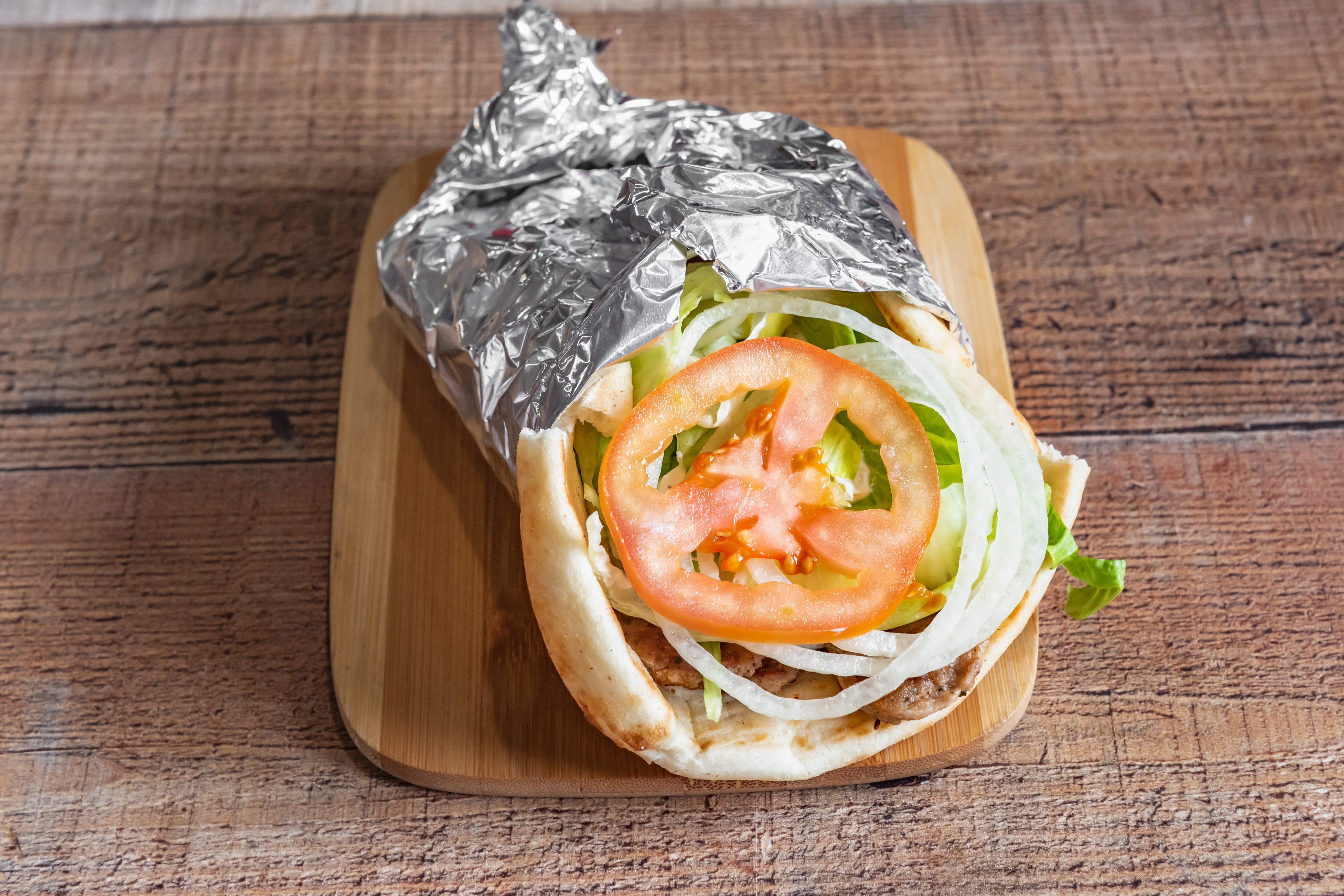 Order Gyro - Large food online from Ray's Famous Pizza store, Allentown on bringmethat.com