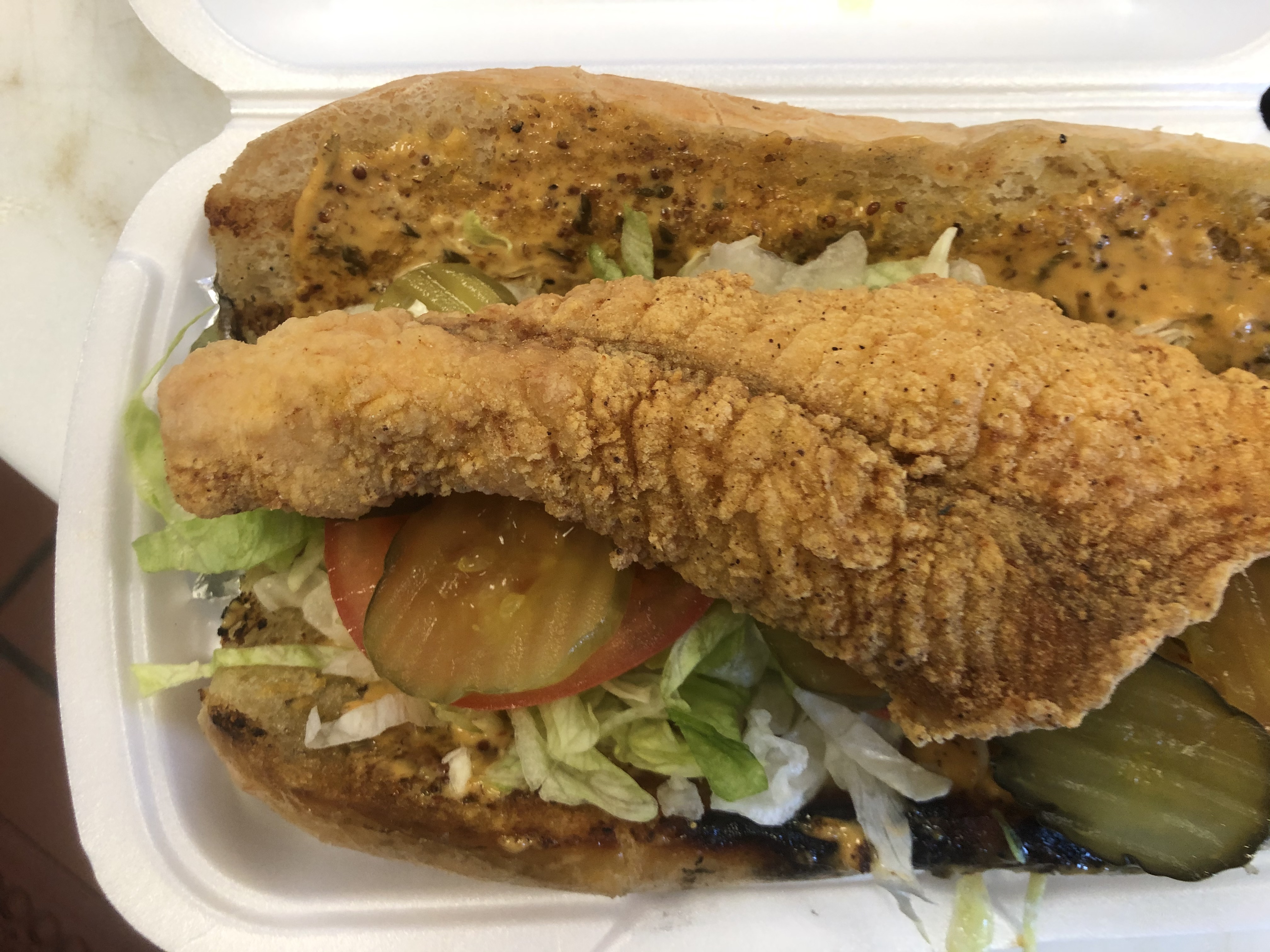 Order Po Boy Catfish food online from Cajun Country Cafe store, Oxnard on bringmethat.com