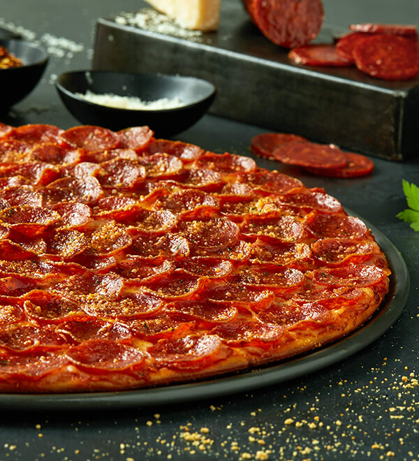 Order Pepperoni Pizza food online from Donatos Pizza store, Delaware on bringmethat.com