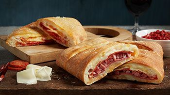 Order Build Your Own Stromboli or Calzone food online from Romeo Pizza store, Stow on bringmethat.com