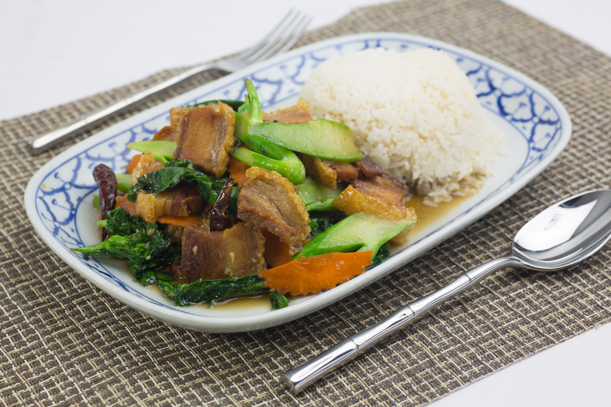 Order Crispy Pork & Chinese Broccoli Over Rice food online from Thai Eagle Rox store, Los Angeles on bringmethat.com