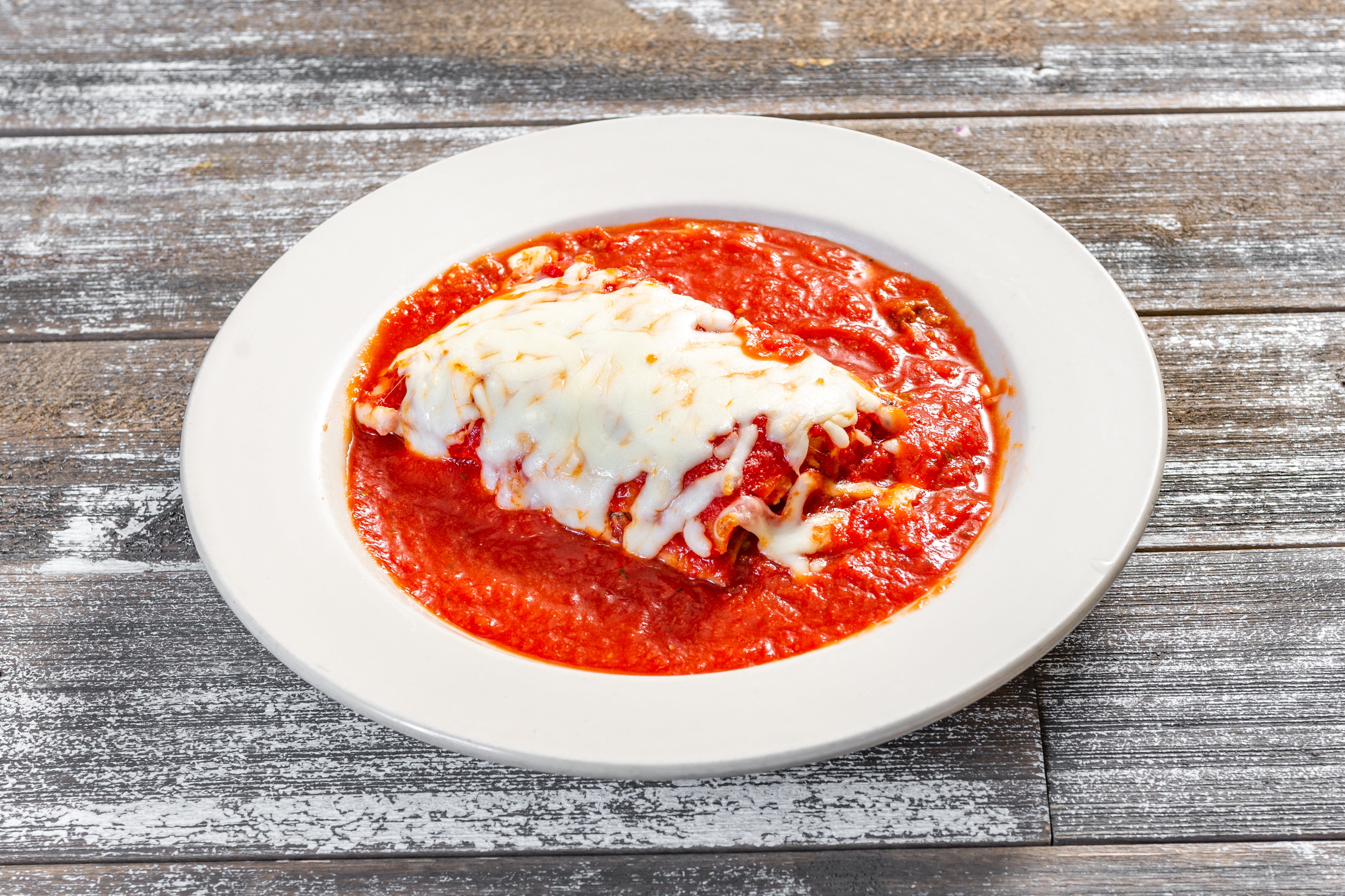 Order Lasagna - Dinner food online from Amato Pizza & Family Restaurant store, Northumberland on bringmethat.com