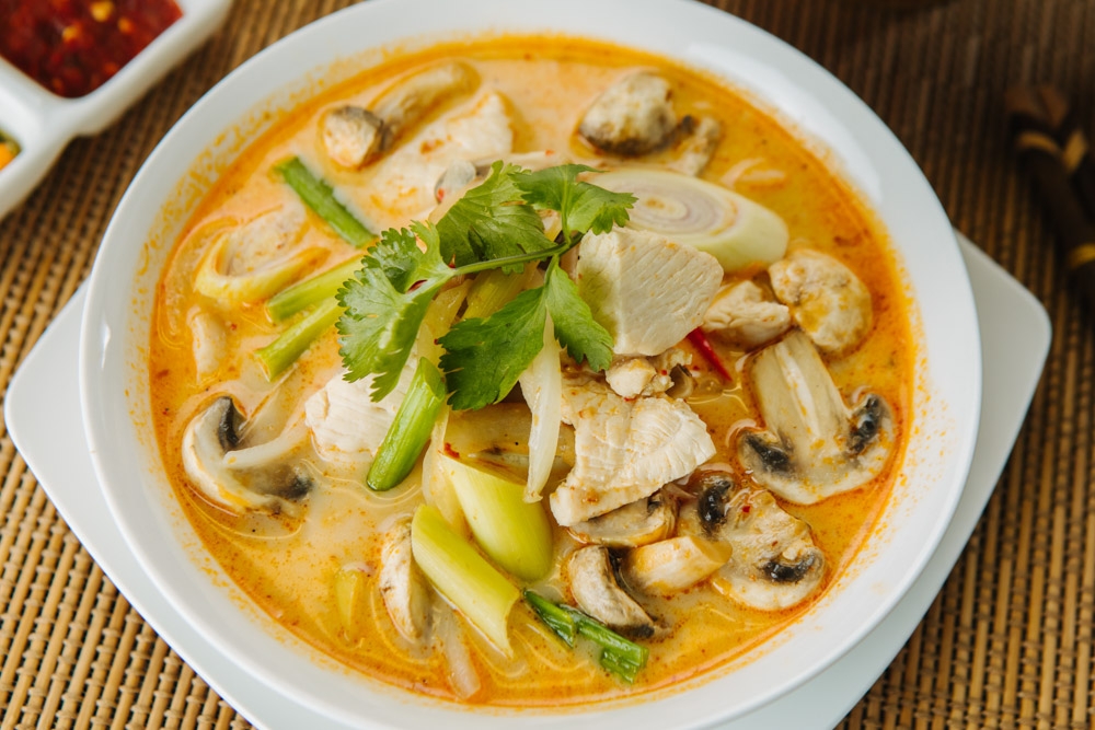 Order Coconut Soup (Tom Kha) - Bowl food online from Banana Leaf Thai Restaurant store, Dallas on bringmethat.com