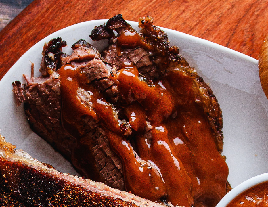 Order Brisket by the Pound food online from Tops Bar-B-Q store, Southaven on bringmethat.com