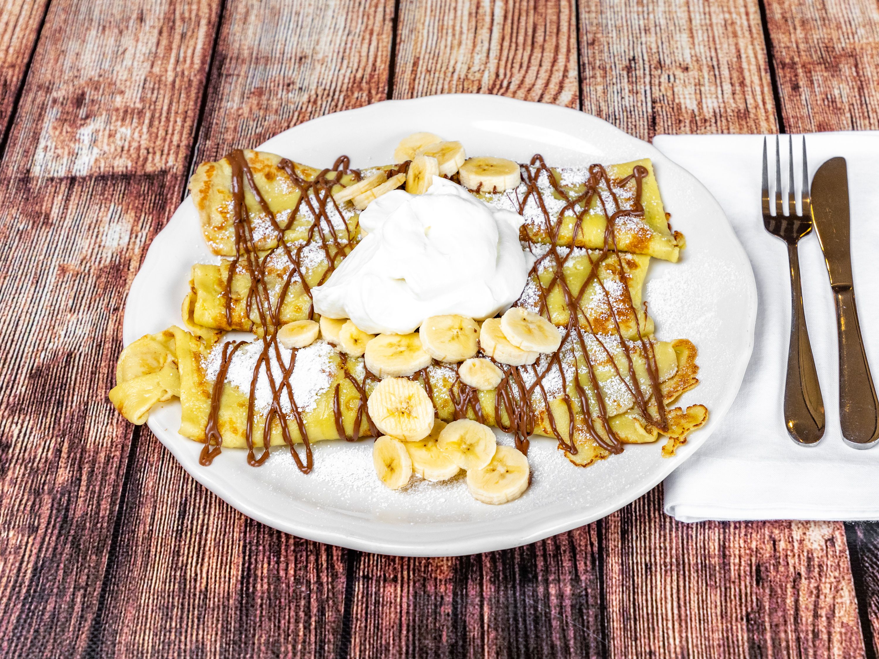 Order Nutella Crepes food online from The Original Pancake House store, Norco on bringmethat.com