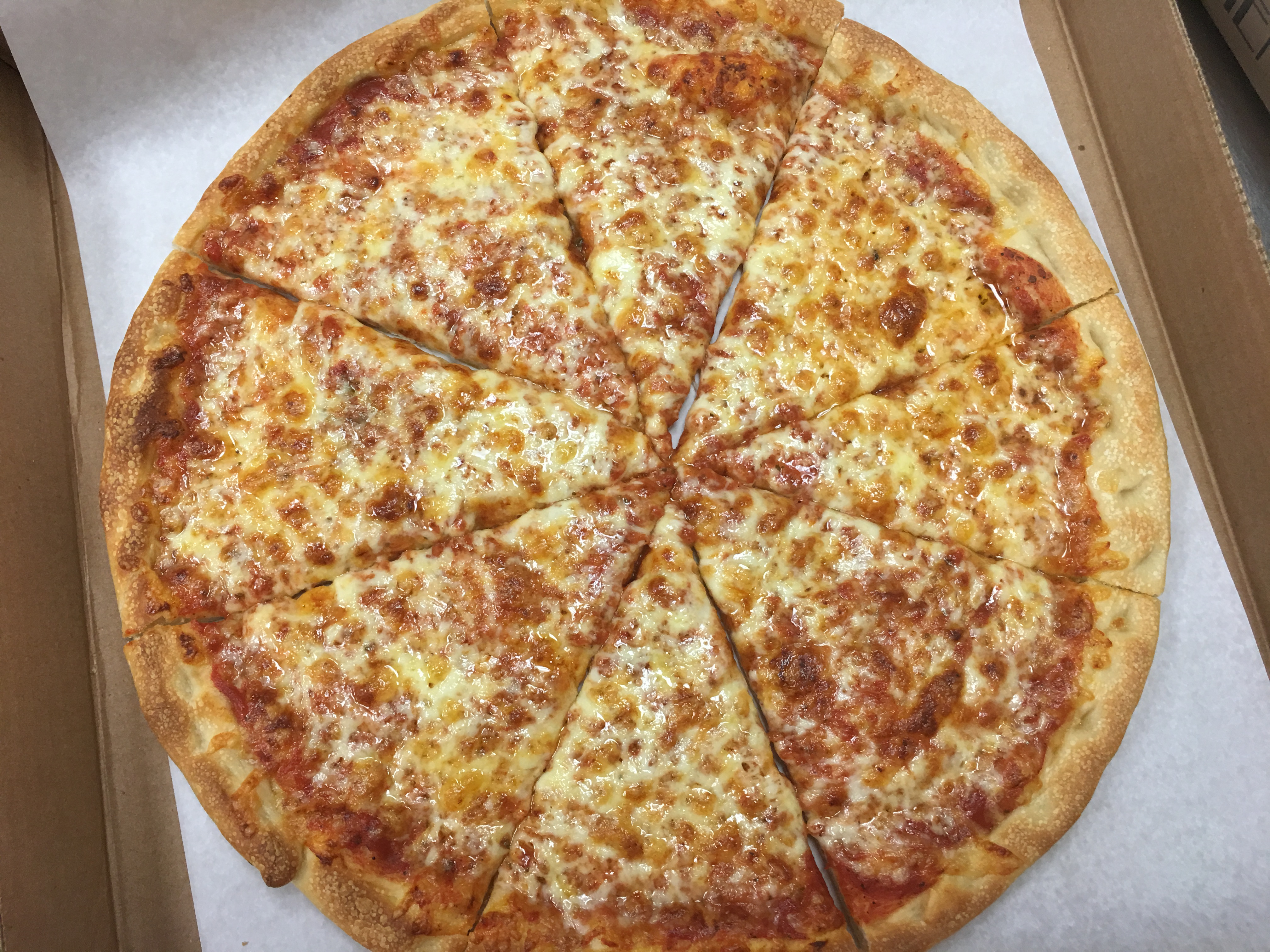 Order Coupon #1 - 2 Large Cheese Pizzas, 2 Liter Soda and 8 Wings food online from Family Style Pizza store, Framingham on bringmethat.com