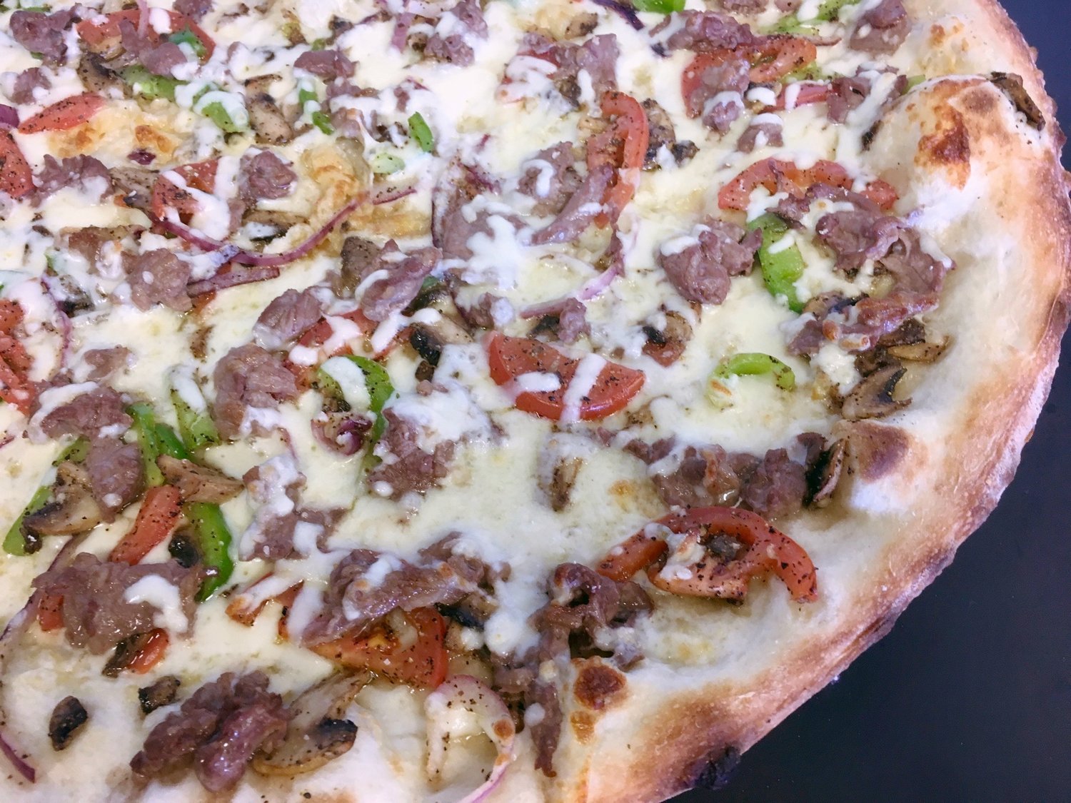 Order Philly Cheese Steak Pizza (White) food online from Yaghi Pizzeria store, San Antonio on bringmethat.com