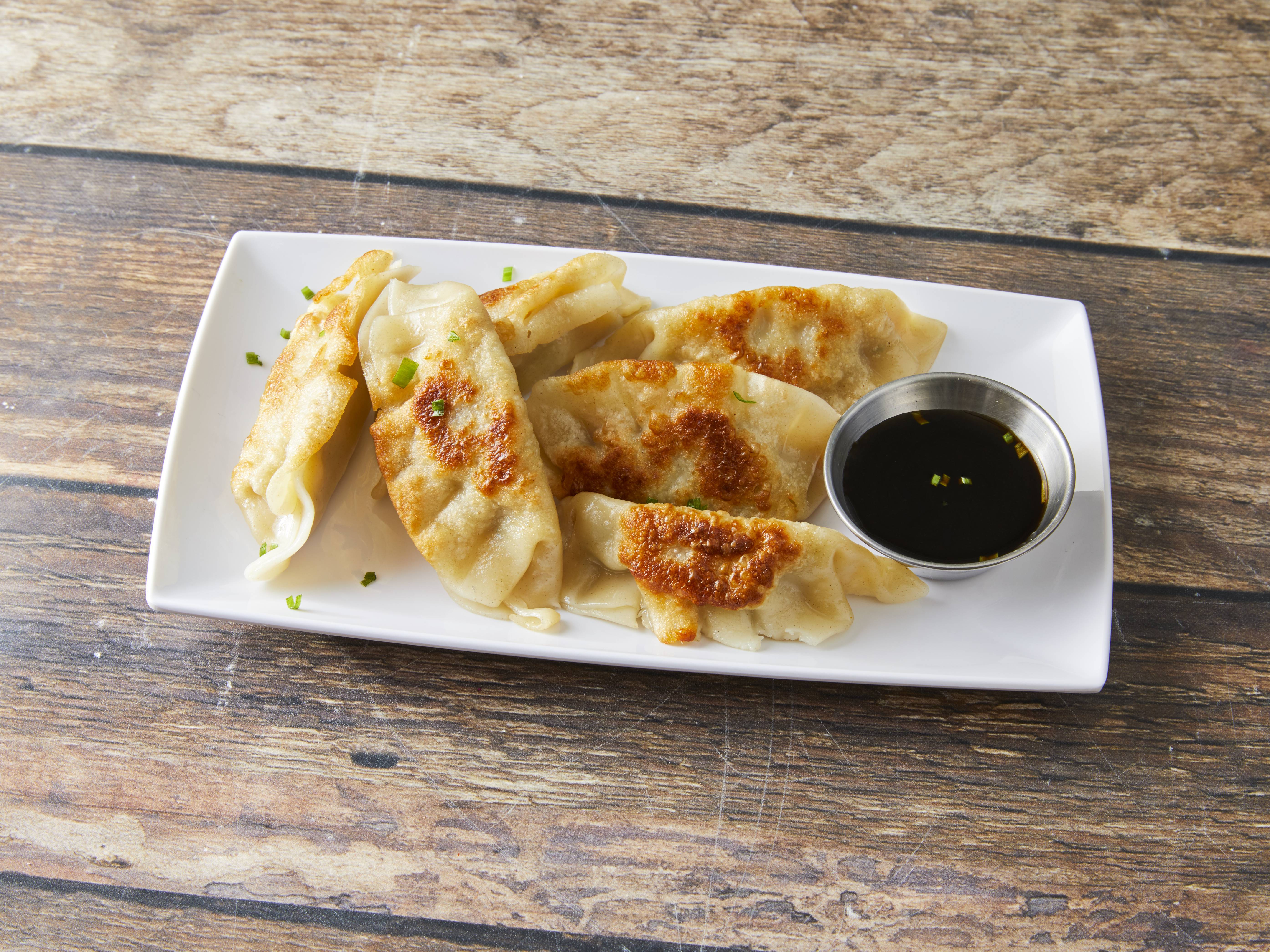 Order 104. Pot Stickers 北平锅贴 food online from Mapo Restaurant store, Naperville on bringmethat.com