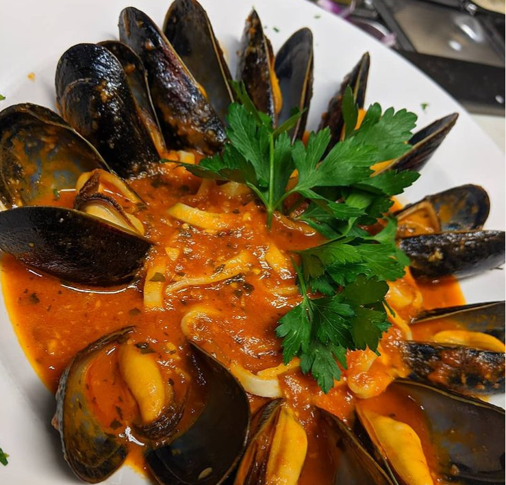 Order Mussel Pasta food online from The Fish House Bar & Grill store, Watsonville on bringmethat.com