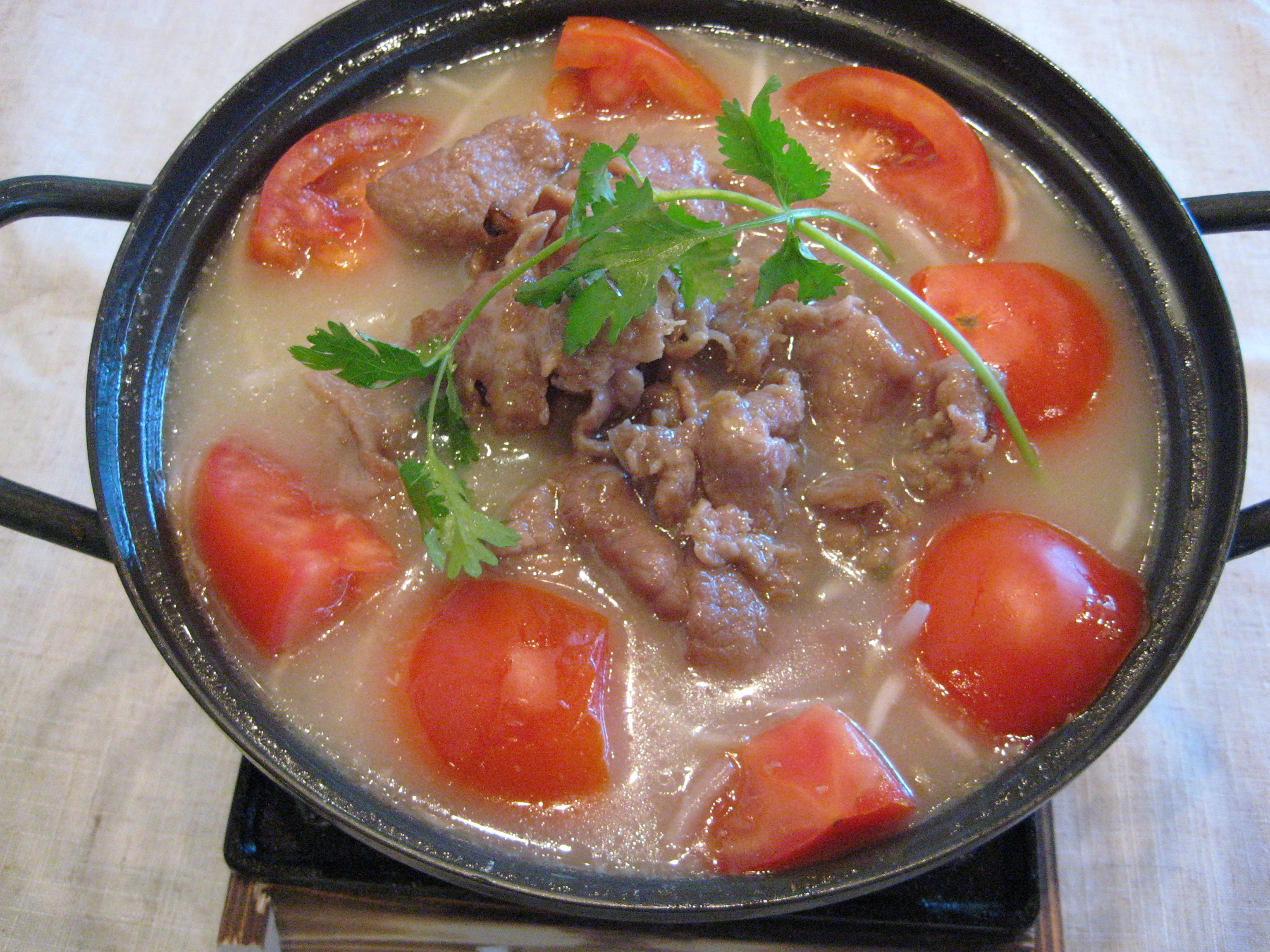 Order Tomato Beef 蕃茄牛肉魚湯 food online from Street Food Cafe store, San Mateo on bringmethat.com