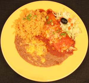 Order C. Cheese, Chicken, Beef, or Carnitas Enchilada food online from Manuel's Mexican store, Tempe on bringmethat.com