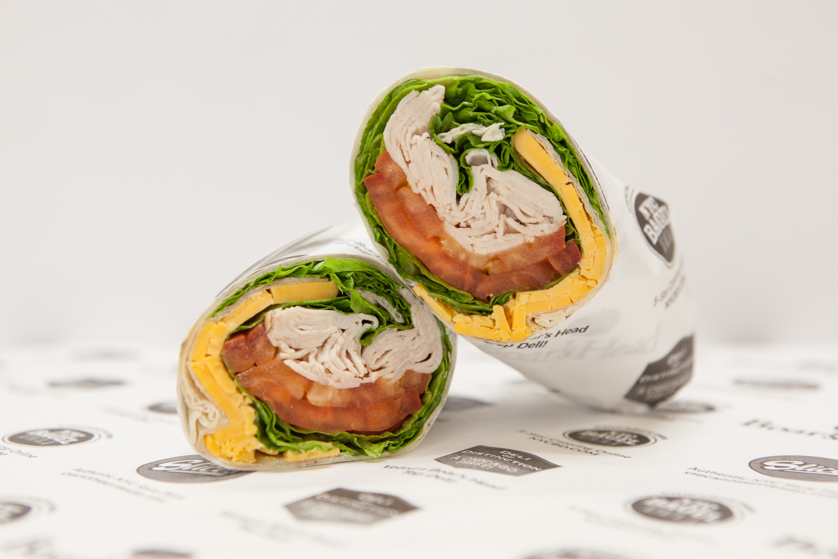 Order Turkey Wrap Sandwich food online from NYC Bagel Deli store, Chicago on bringmethat.com