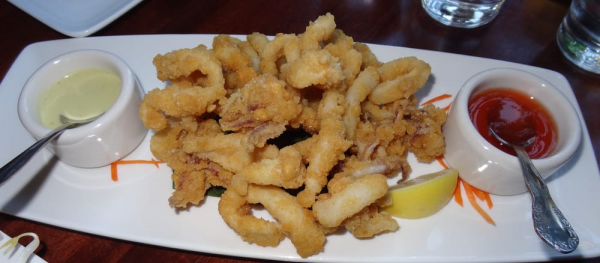 Order Fried Calamari food online from Rin's Thai Restaurant store, San Francisco on bringmethat.com