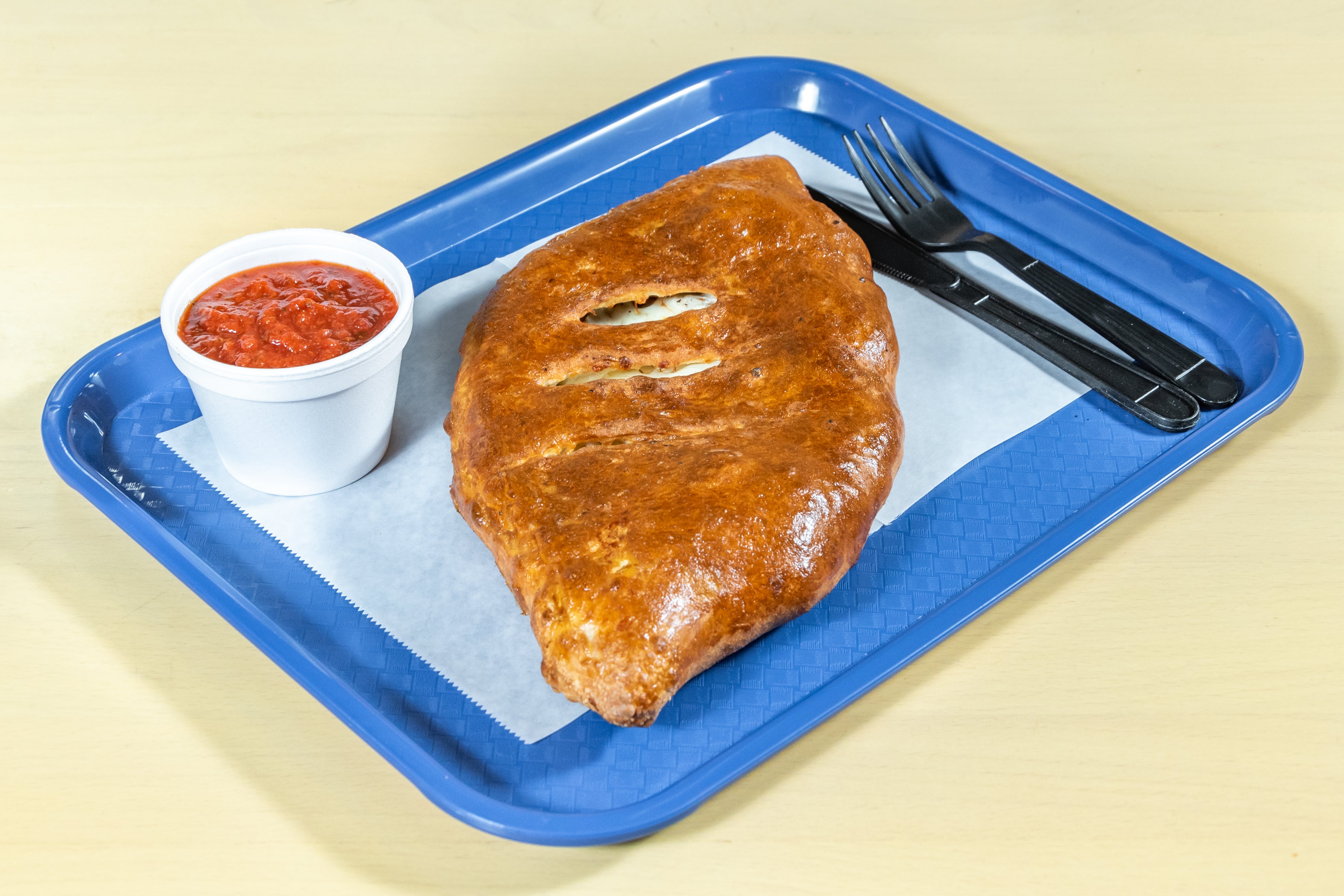Order Calzone - Calzone food online from Amadeo's Pizza - Coors Blvd SW store, Albuquerque on bringmethat.com