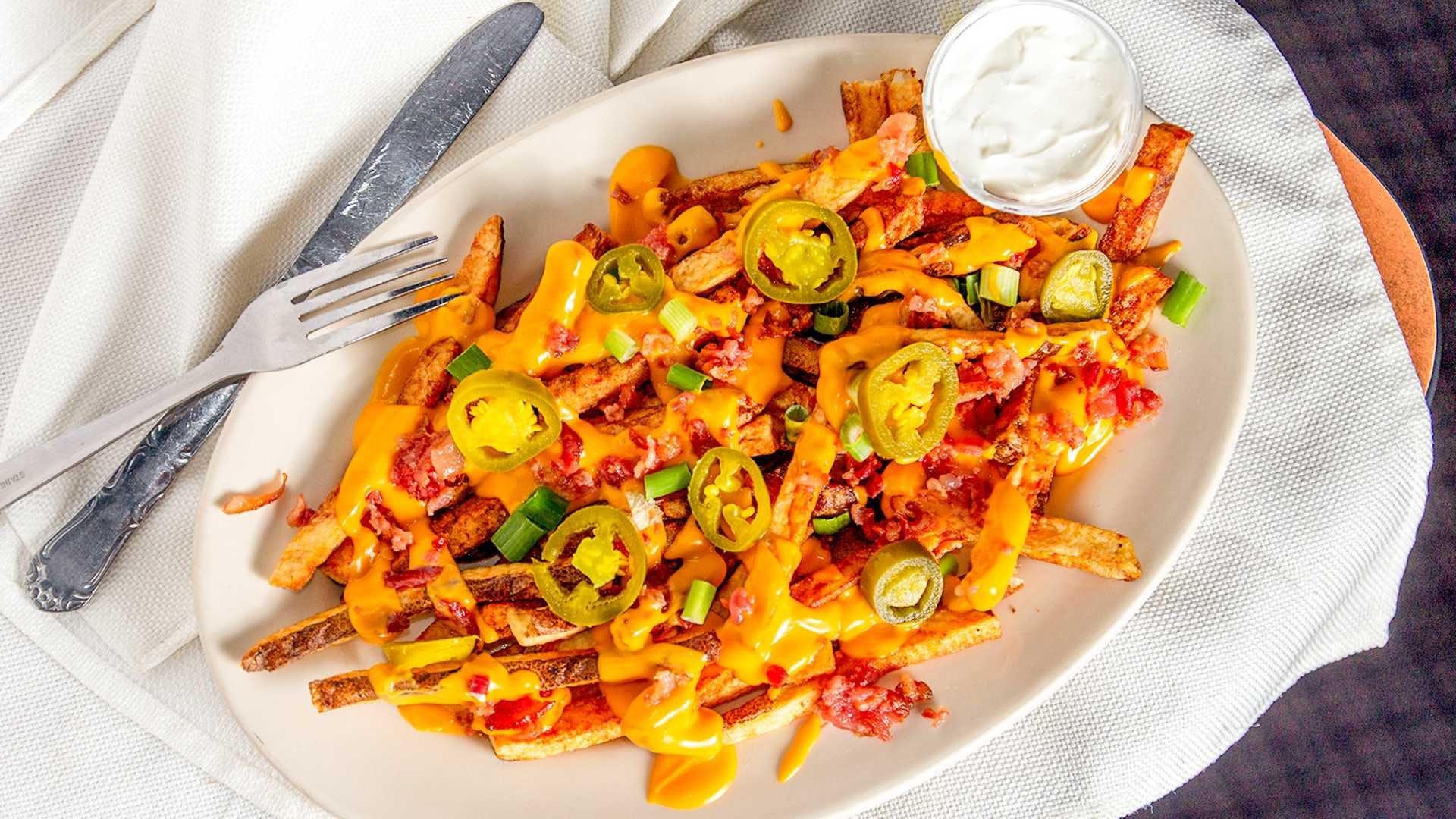 Order Nacho Mamas Fries - Large food online from Friendly Tavern store, St Marys on bringmethat.com