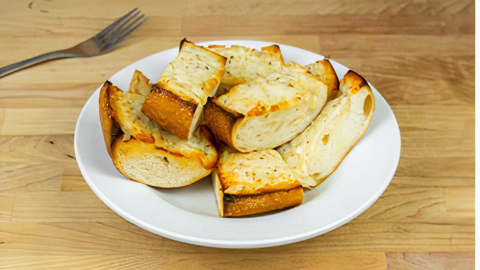 Order Garlic Bread food online from Toto's Pizzeria & Restaurant store, Belmont on bringmethat.com