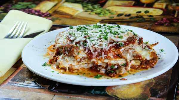 Order Baked Lasagna food online from Domani Pizzeria & Restaurant store, Seattle on bringmethat.com