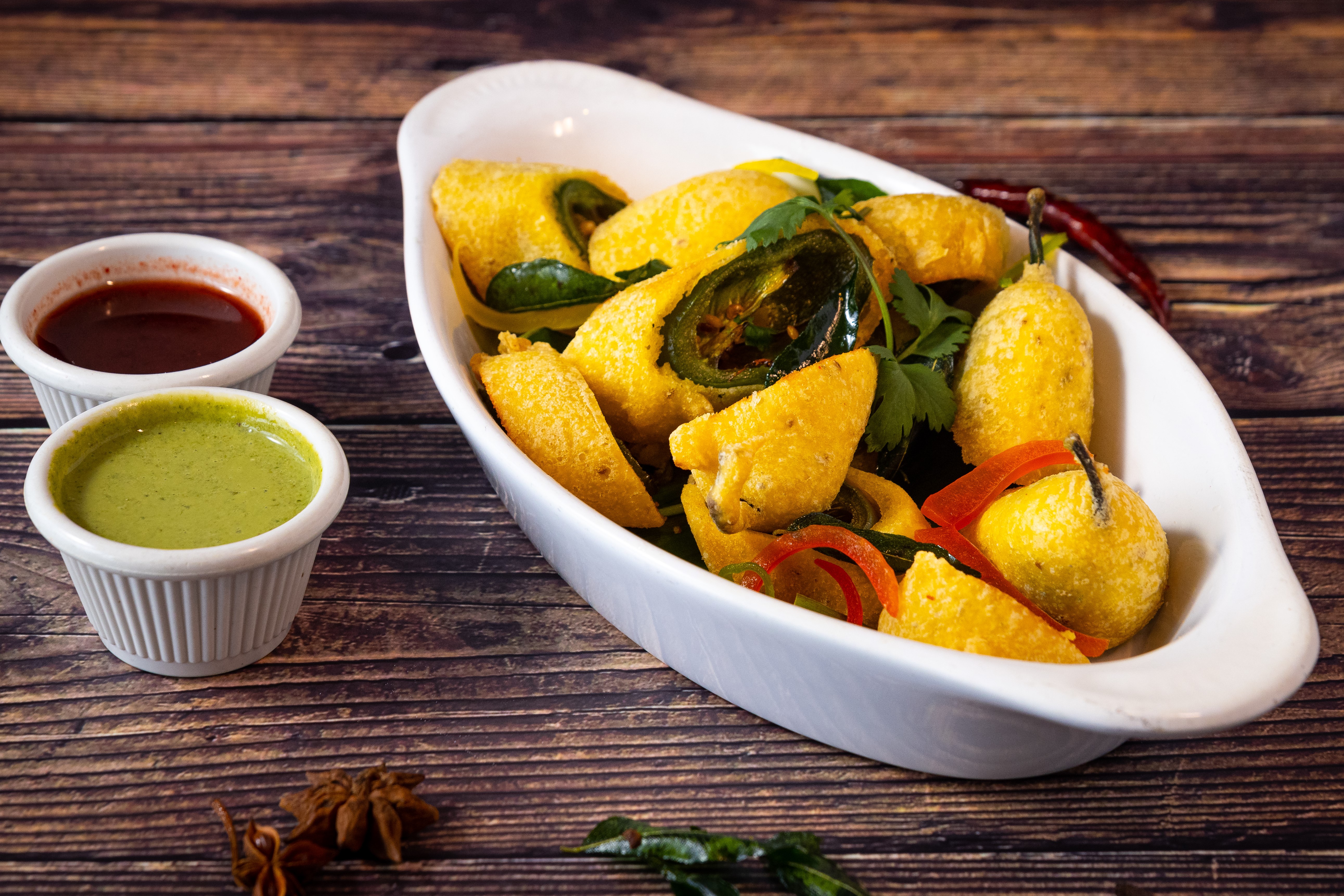 Order Cut Mirchi pakora food online from Amaravati Indian Cuisine store, Brentwood on bringmethat.com