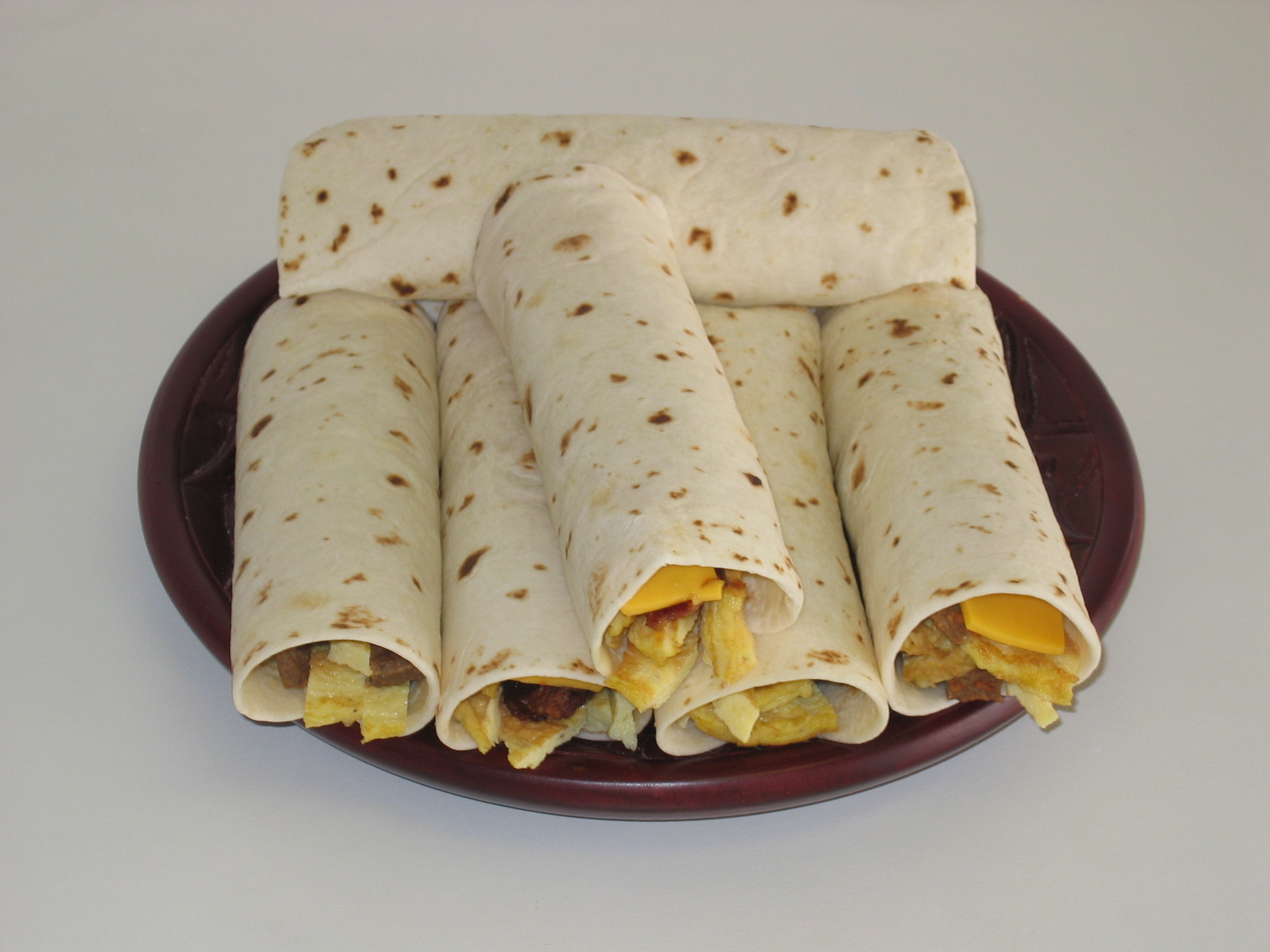 Order Ham, Egg and Cheese Taco food online from Malenee Donuts store, La Porte on bringmethat.com
