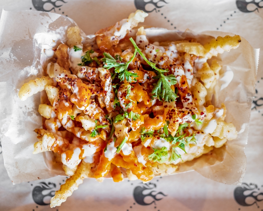Order REG - FIRE FRIES food online from Fire Wings store, Rancho Cucamonga on bringmethat.com