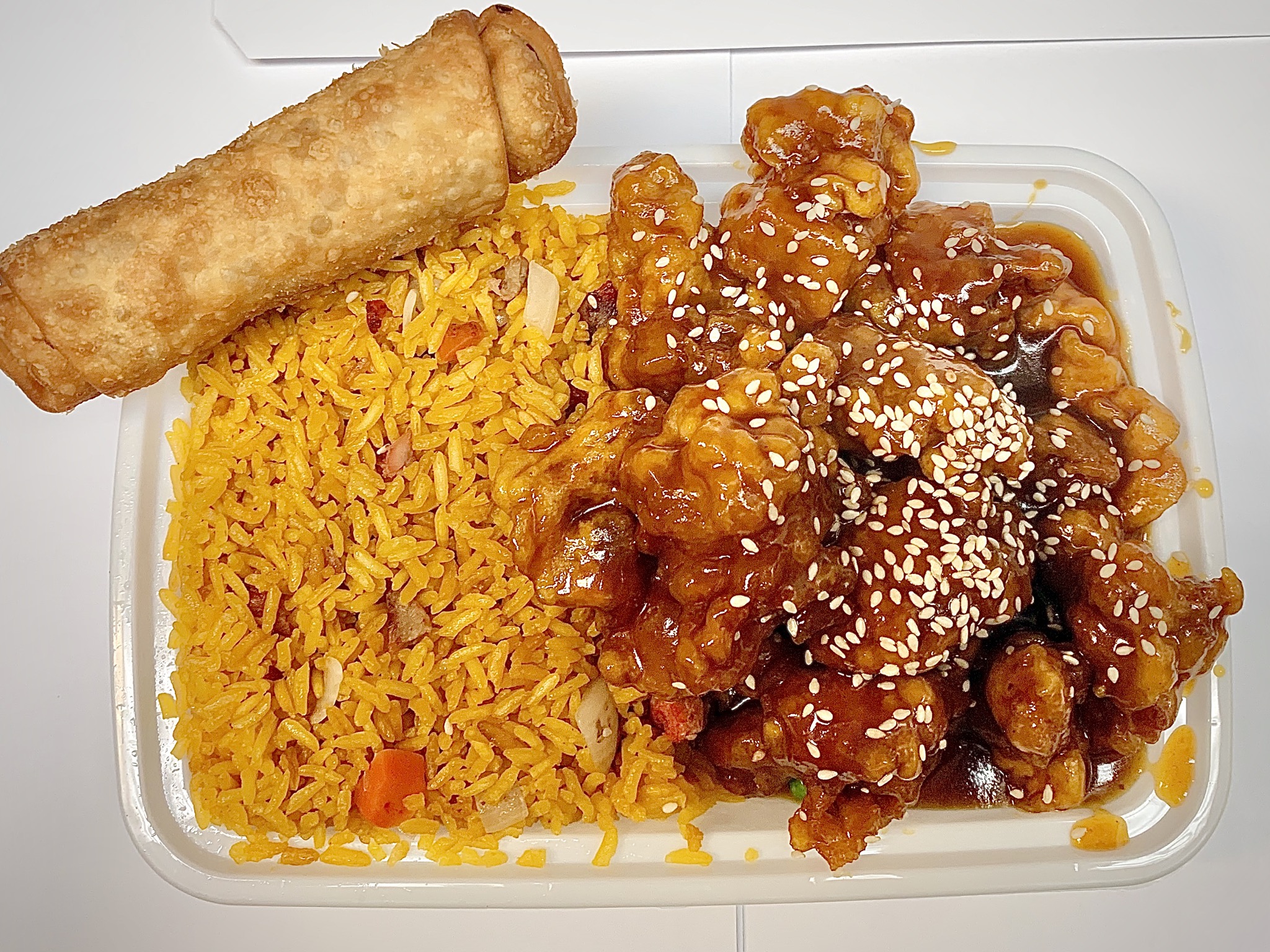 Order C9. Sesame Chicken food online from New China store, Durham on bringmethat.com