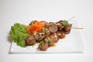 Order 4. Beef Meatball Stick food online from Thai Wok-In & Go store, Dallas on bringmethat.com