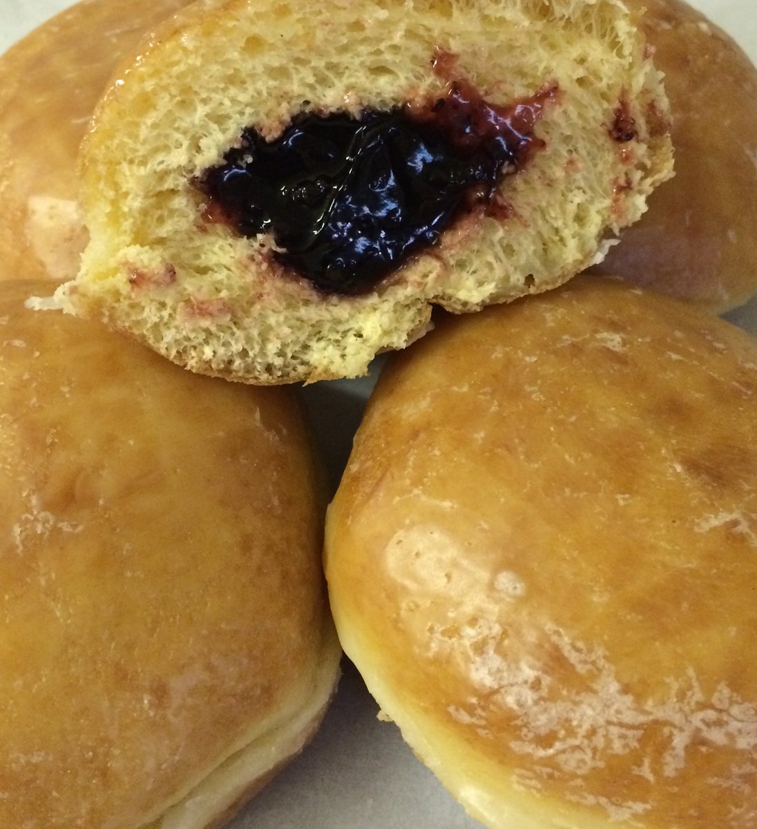 Order Blueberry Filled Long John food online from Daylight Donuts store, Hilliard on bringmethat.com