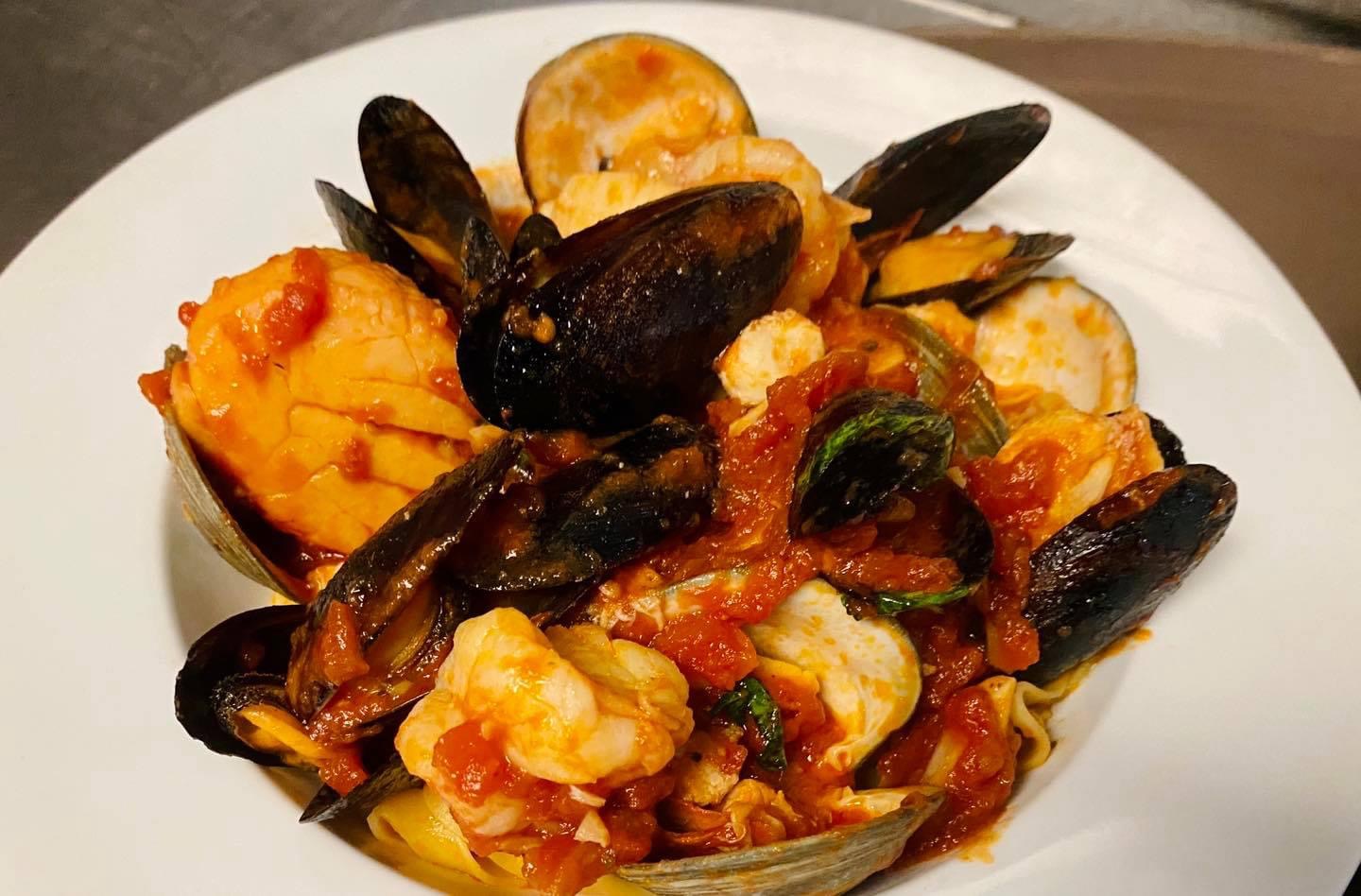 Order Pescatore Risotto Dinner food online from Padrino's Bistro store, Trenton on bringmethat.com