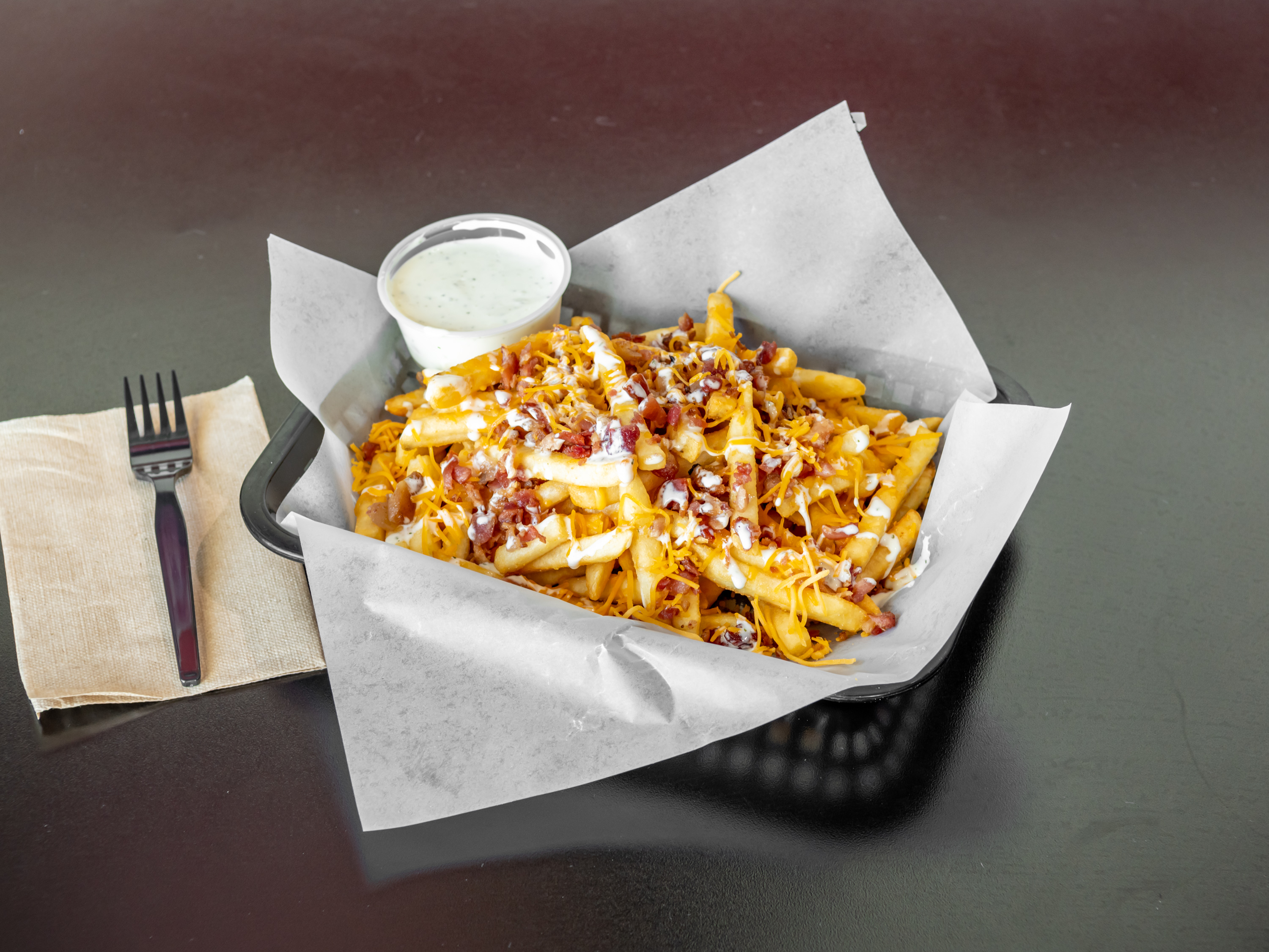 Order Bacon Ranch Fries food online from Geno's Pizzerias store, Gilbert on bringmethat.com
