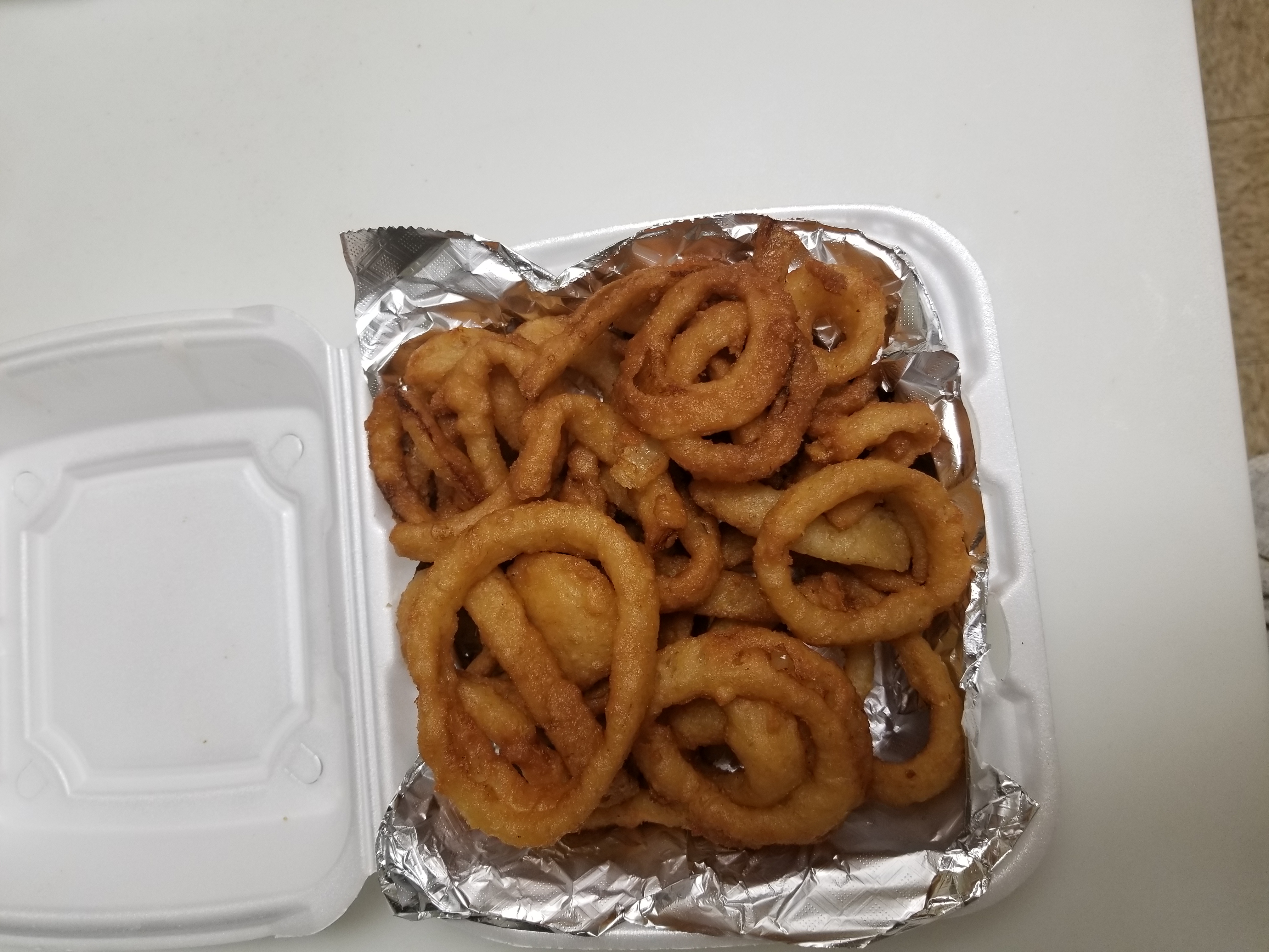 Order Onion Rings food online from H & A Deli store, Rochester on bringmethat.com
